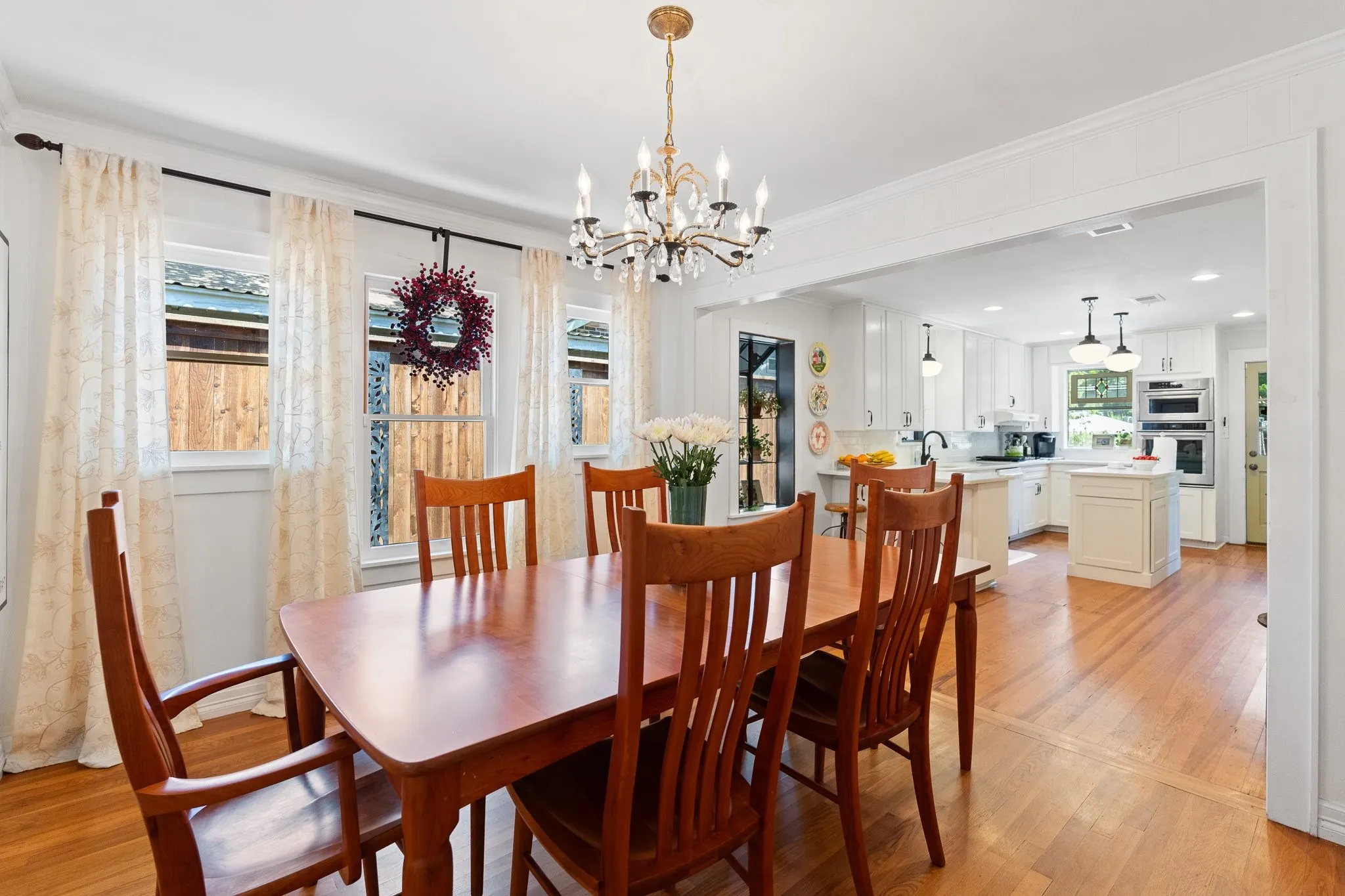 Here's a shot of the dining room with hardwood floors and open to the fully renovated kitchen!