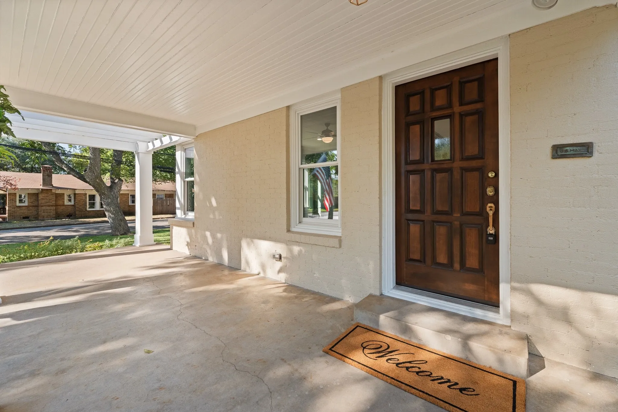 Look at this expansive front porch. Just add your furniture and enjoy the cooler evenonigs...(hopefully!)