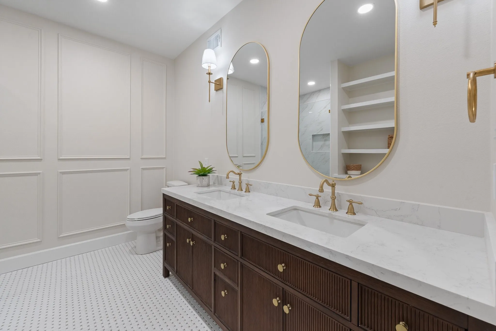 Here's the primary bathroom. You'll feel like you're in a luxurious hotel!