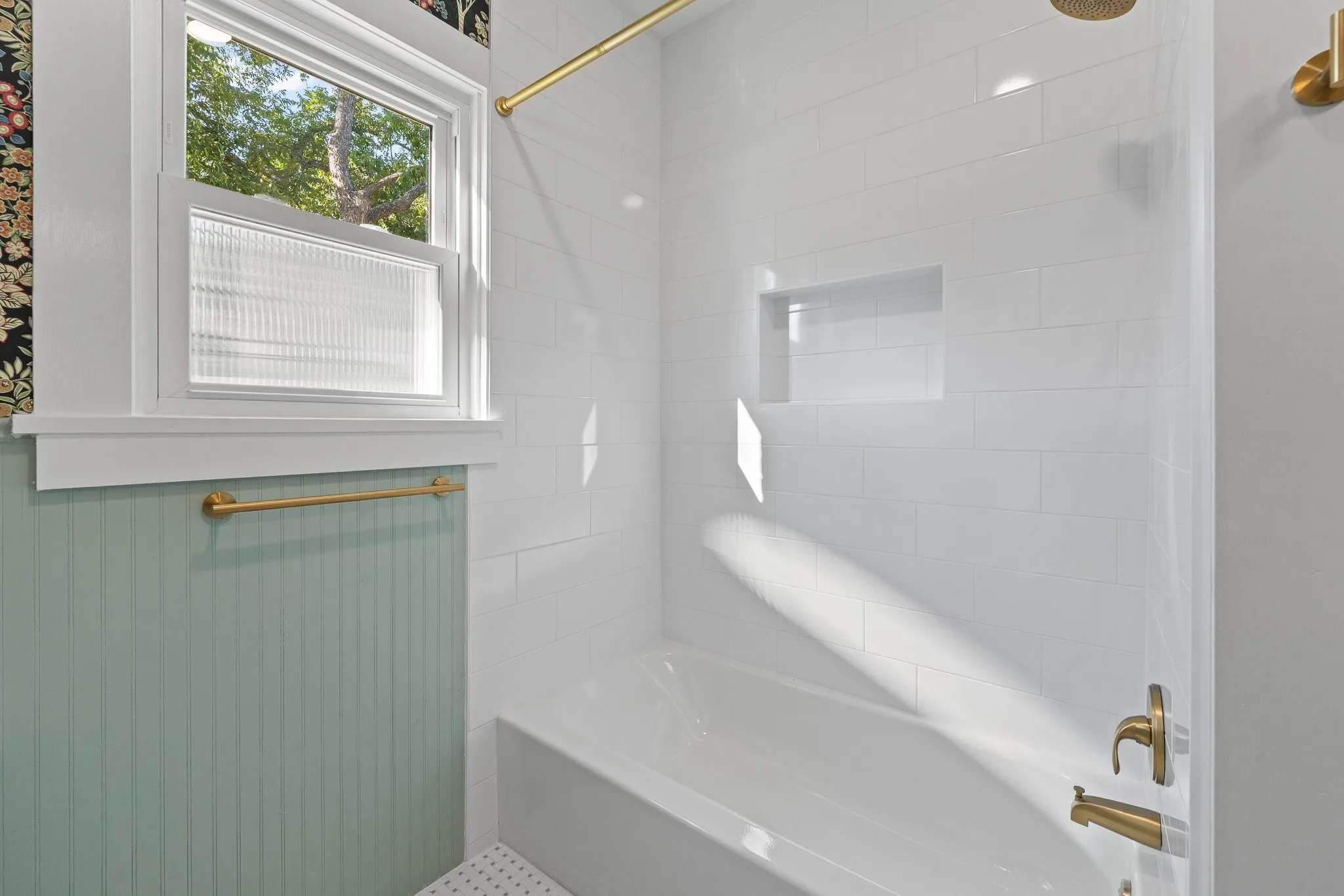 This is a full bathroom to go with this second primary bedroom downstairs!