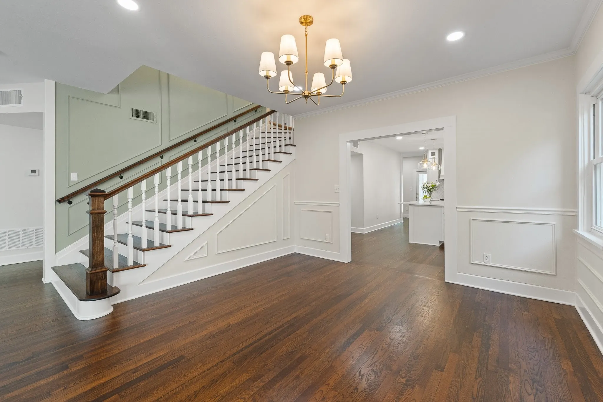 This is another shot of the large living room and the dining room. Tons of natural light!