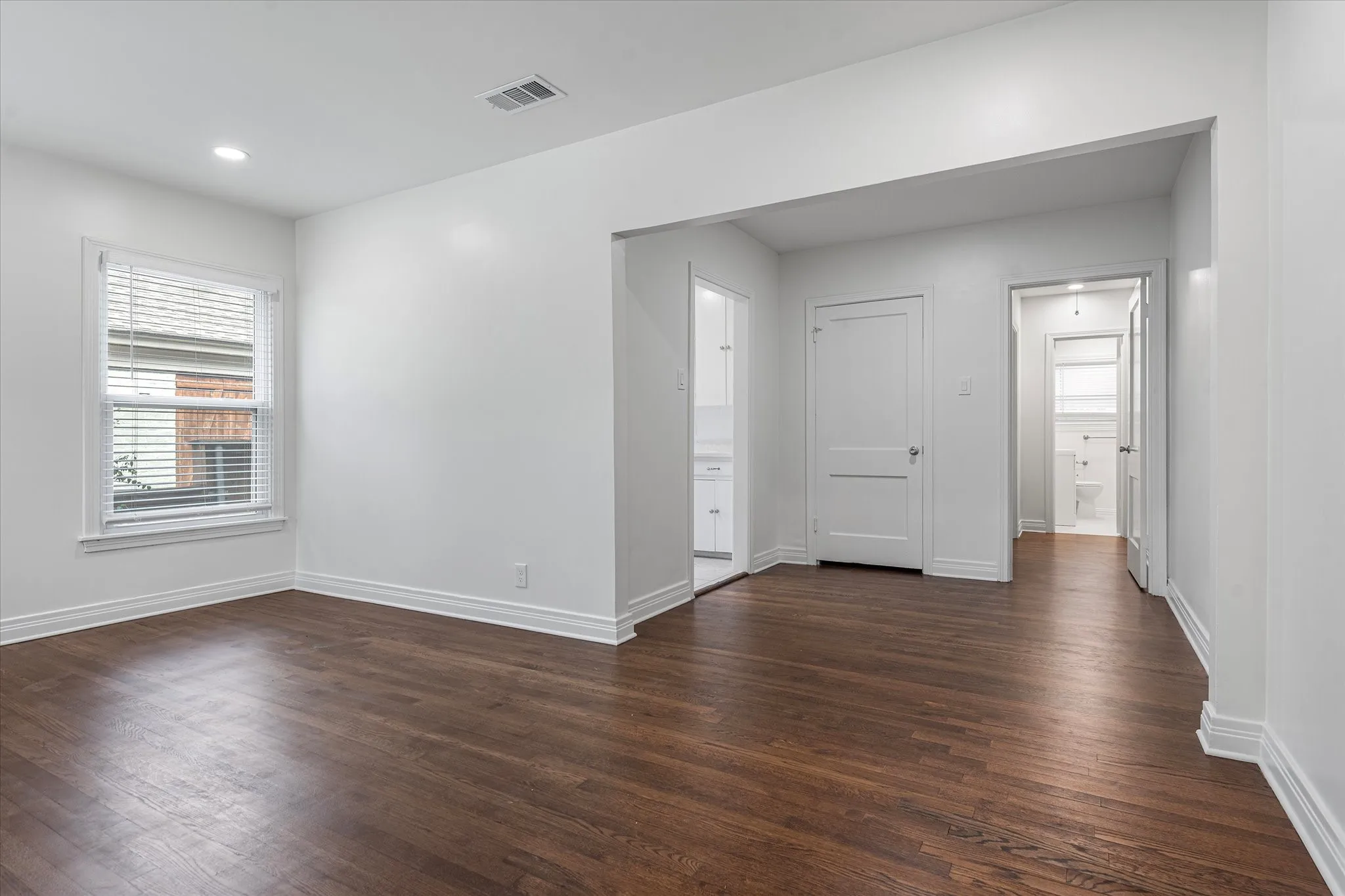Leading From The Living Room Down The Hall By The Kitchen To The Bedroom.