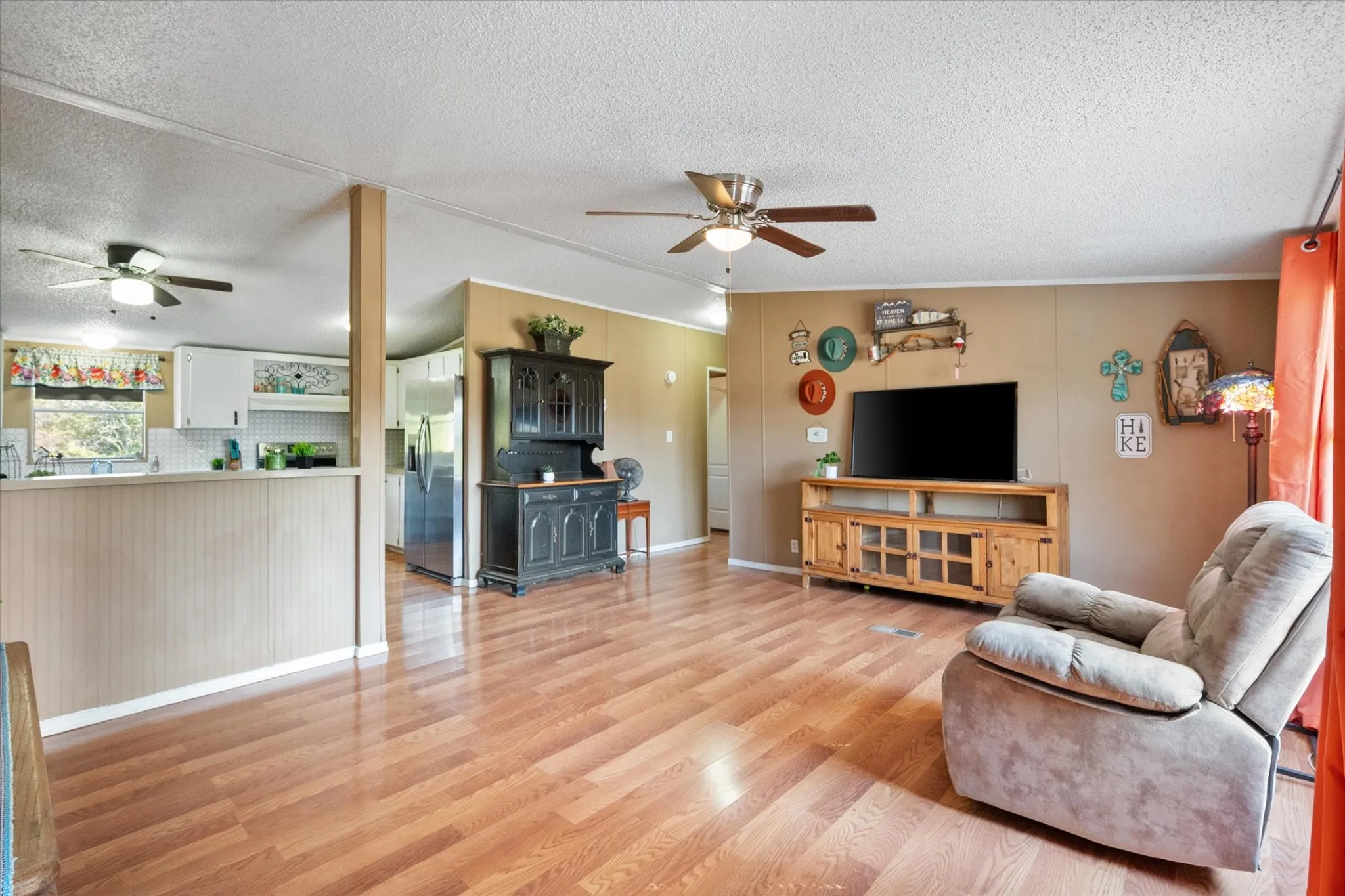 Wood-finish flooring throughout the living space