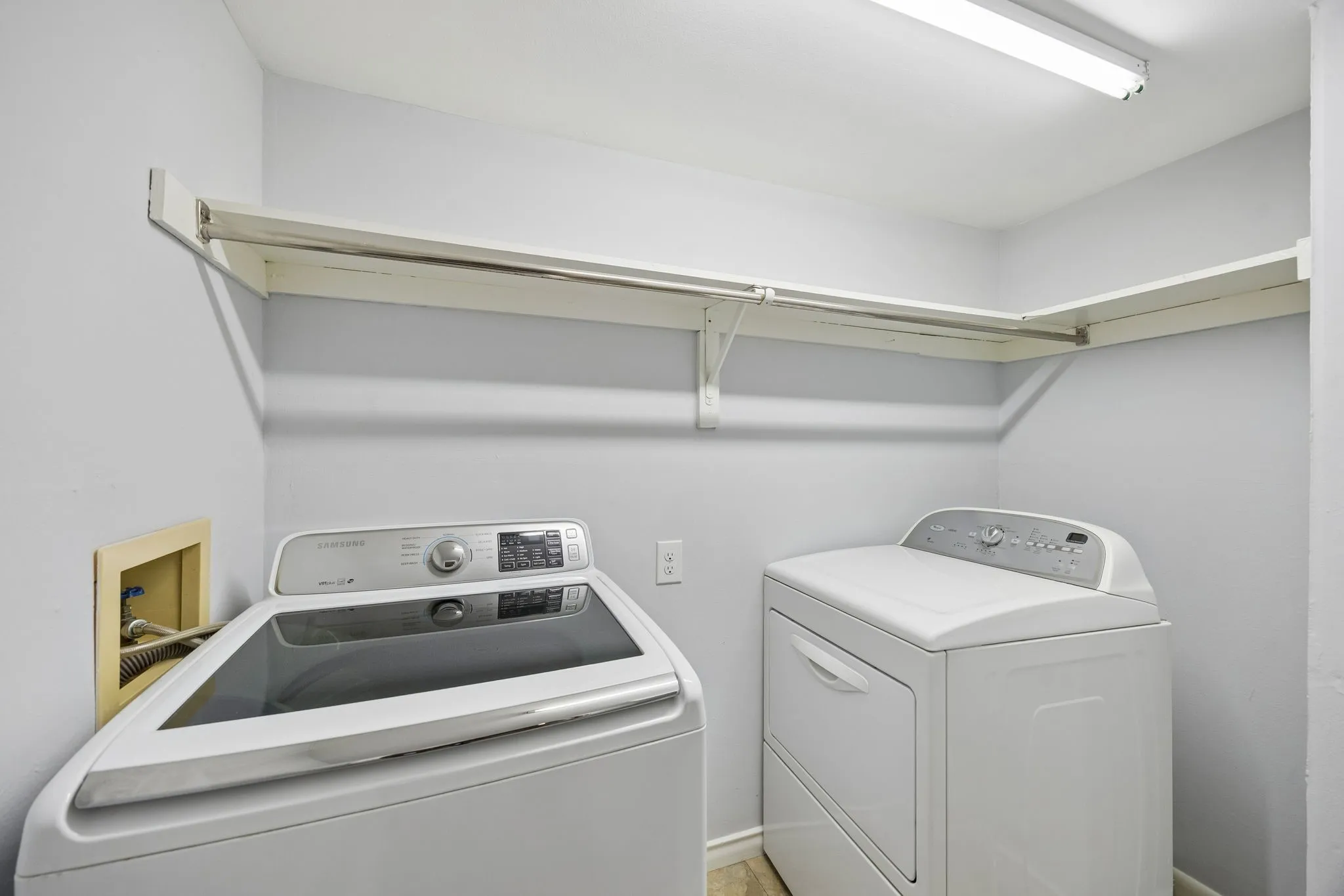 Utility Room accommodates full size washer & dryer