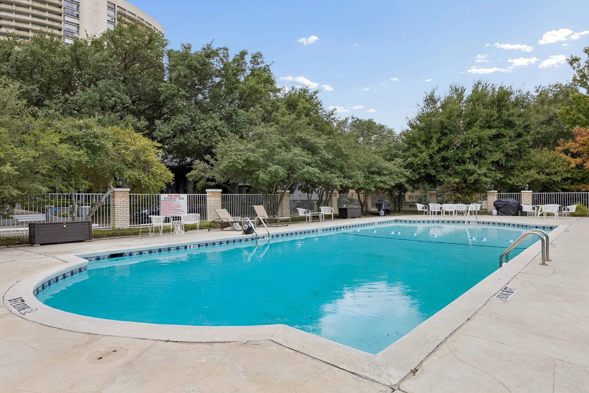 Community Lap Size Pool with its large patio & grills for entertaining