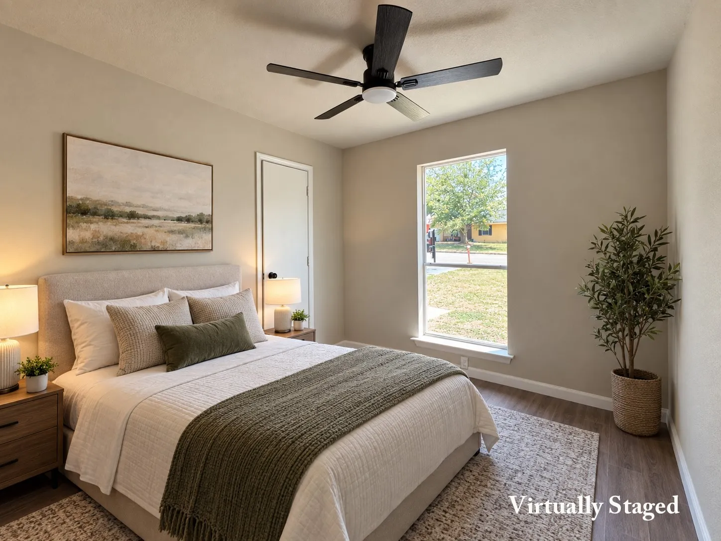 Neutral wall color, wood-finish flooring, ceiling fan with integrated lighting, single pane window, and a white door with black hardware