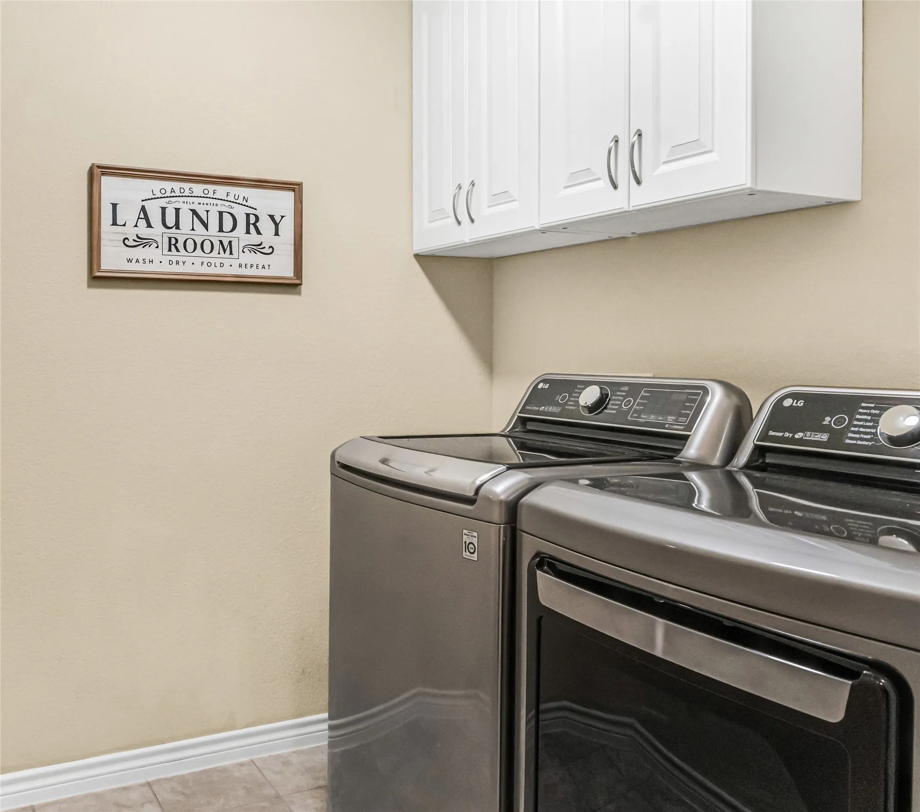 Large Utility Room with built in cabinets. LG Inverter Direct Drive washer and dryer set are​​‌​​​​‌​​‌‌​‌‌​​​‌‌​‌​‌​‌​​​‌​​ negotiable.