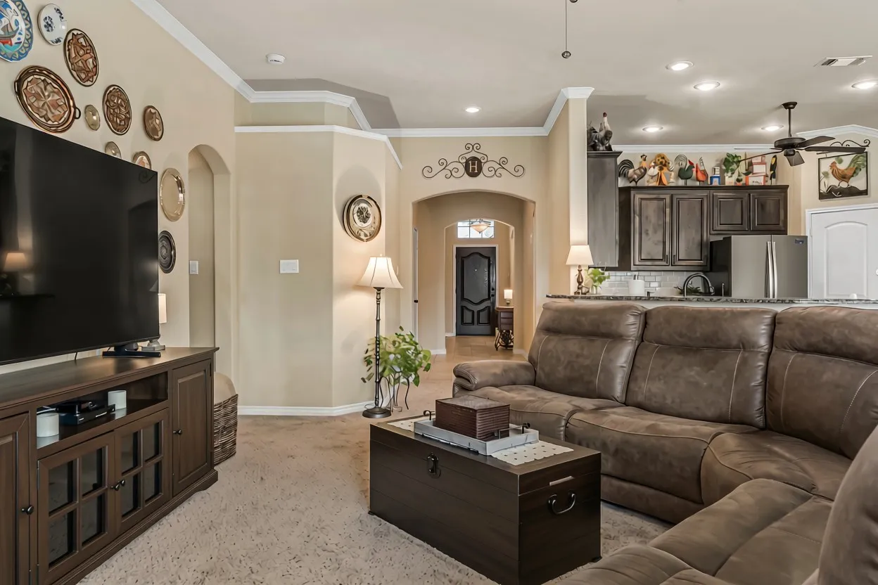 Large living room open to kitchen and dining area.