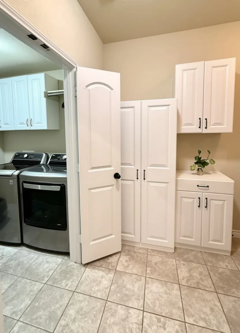 Extra storage in mud room area between laundry and garage