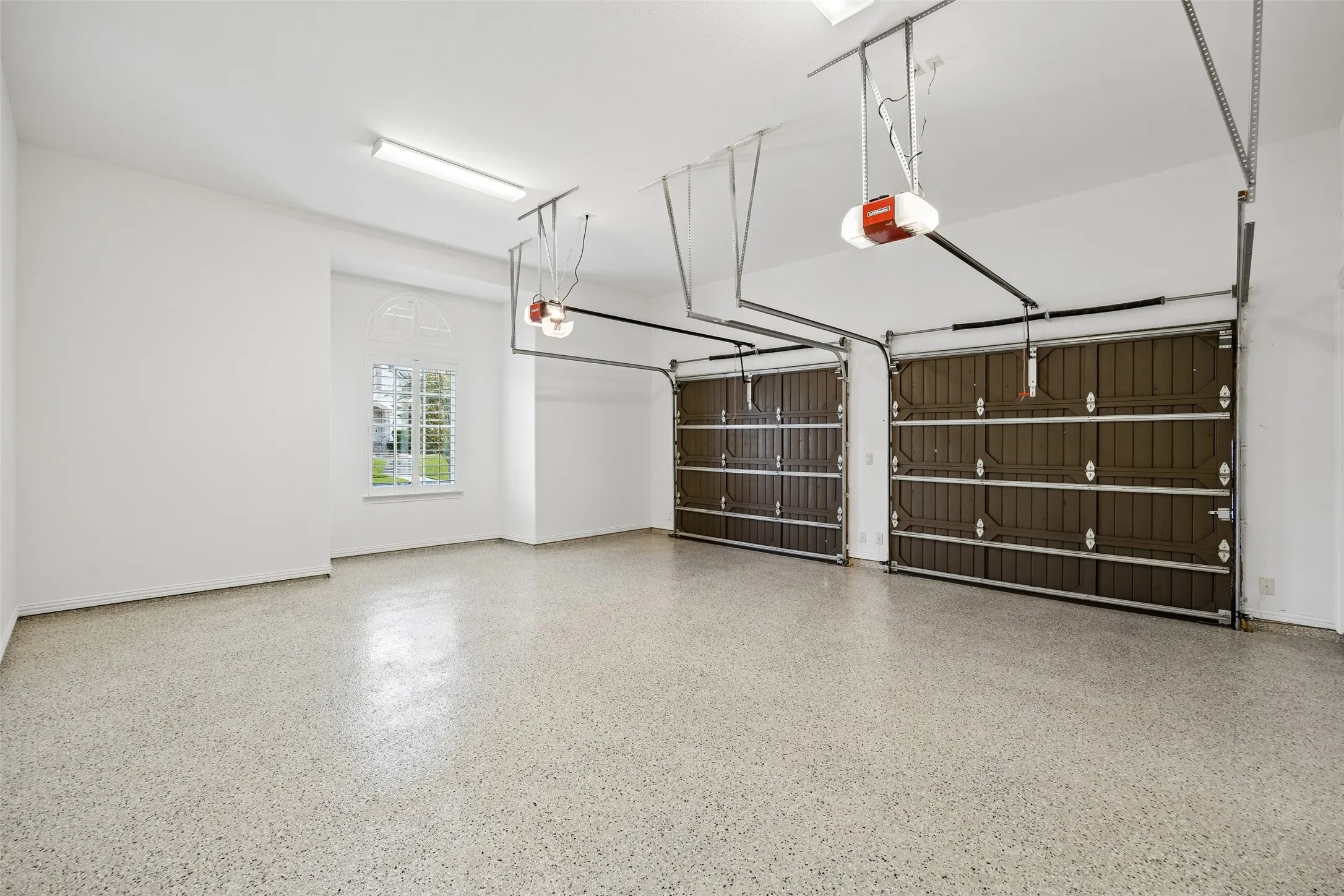 Private Garage Access to Primary Bedroom with Epoxy Floor