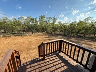 Gazing into backyard and into fully treed pasture land
