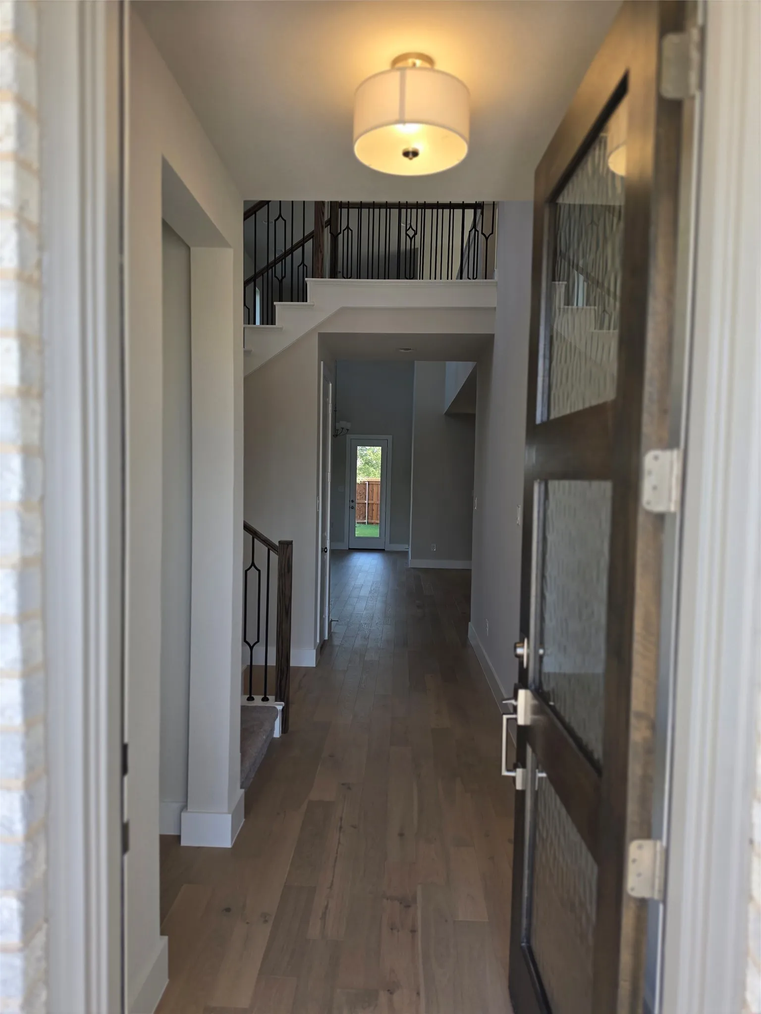 Beautiful Engineered Hardwood floors, glass door