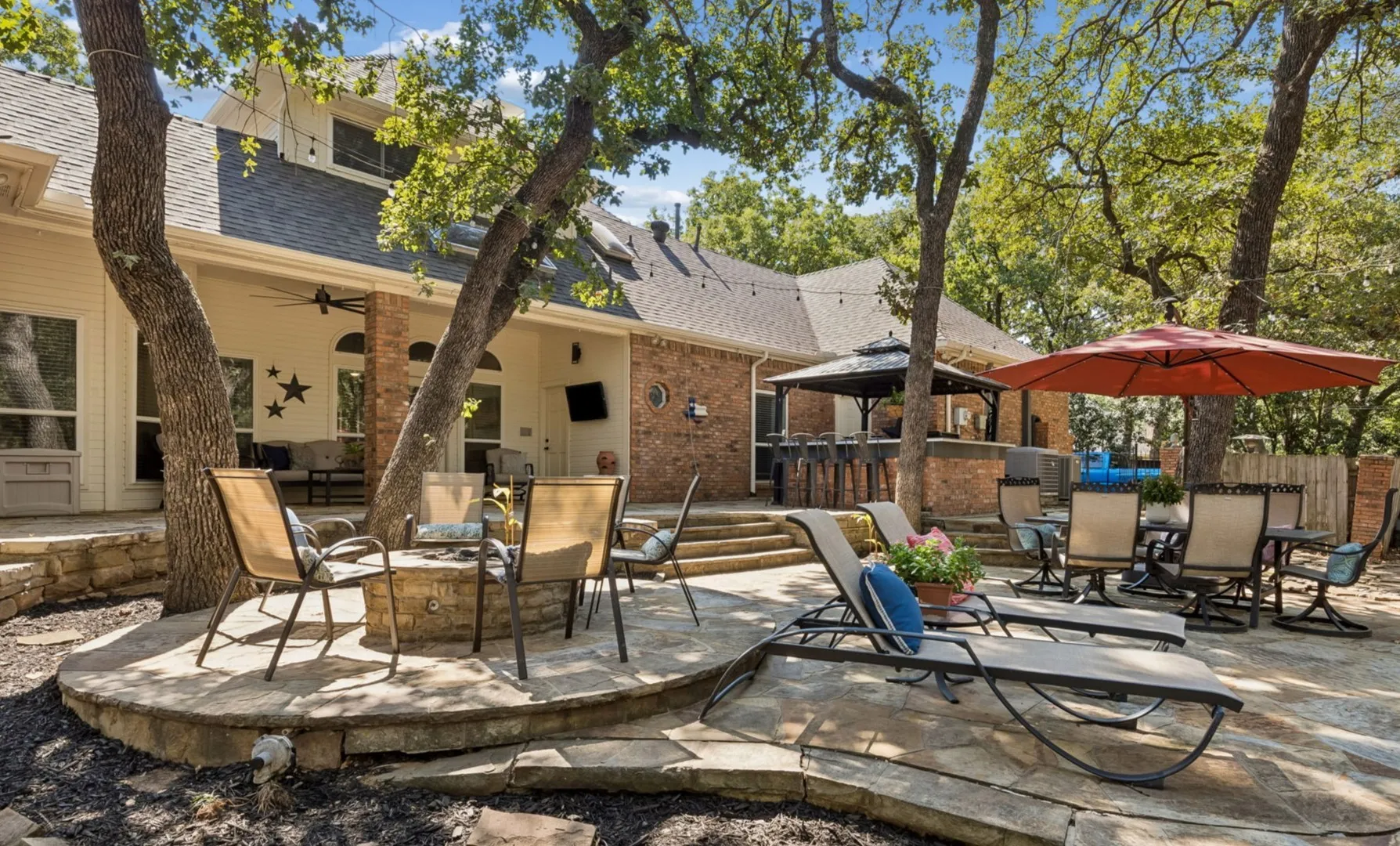 Family room overlooks fabulous backyard.