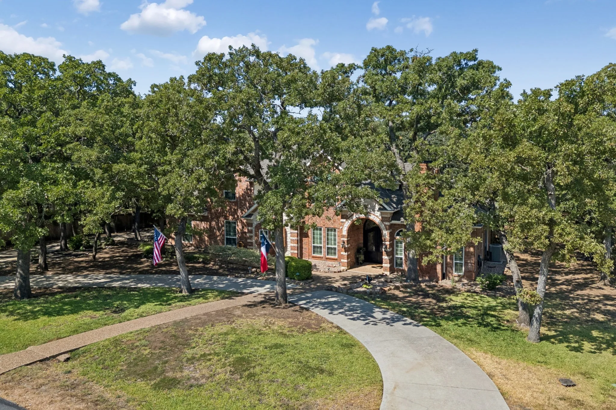 Circular driveway, 3 car garage, a lots of room for parking.