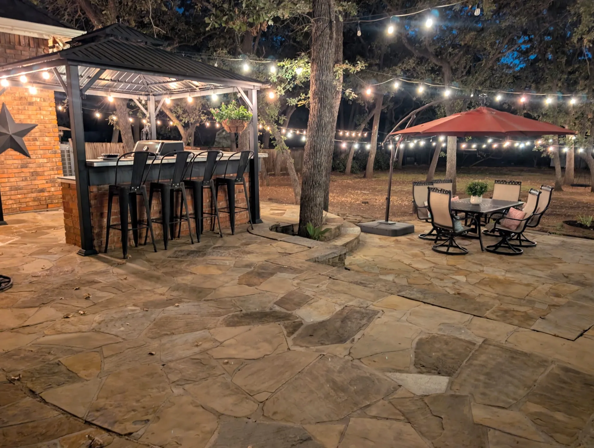 Year-round outdoor space for entertaining, including pergola with kitchen.