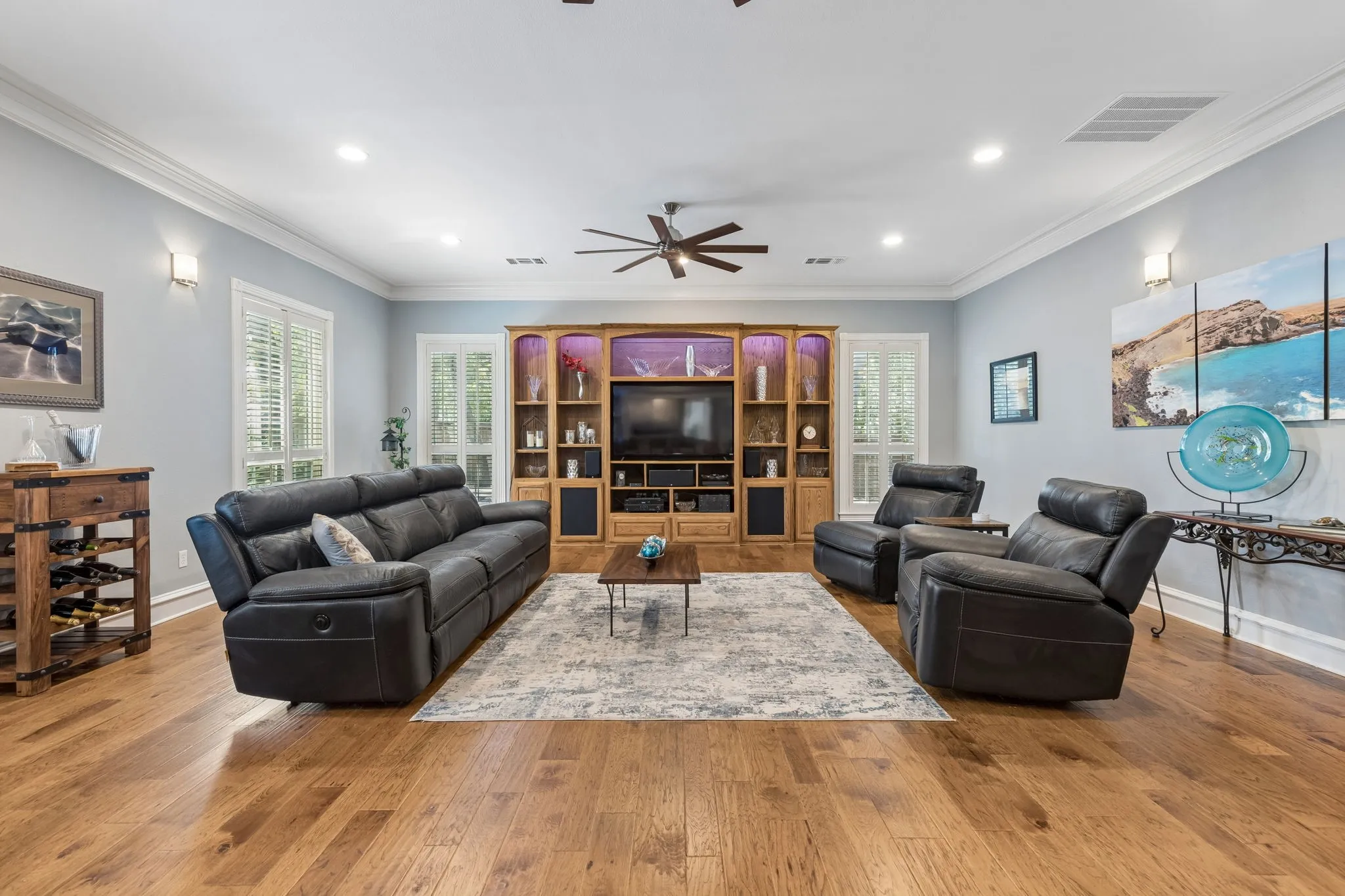 Massive Den just off the kitchen features built-ins and hardwood floors.
