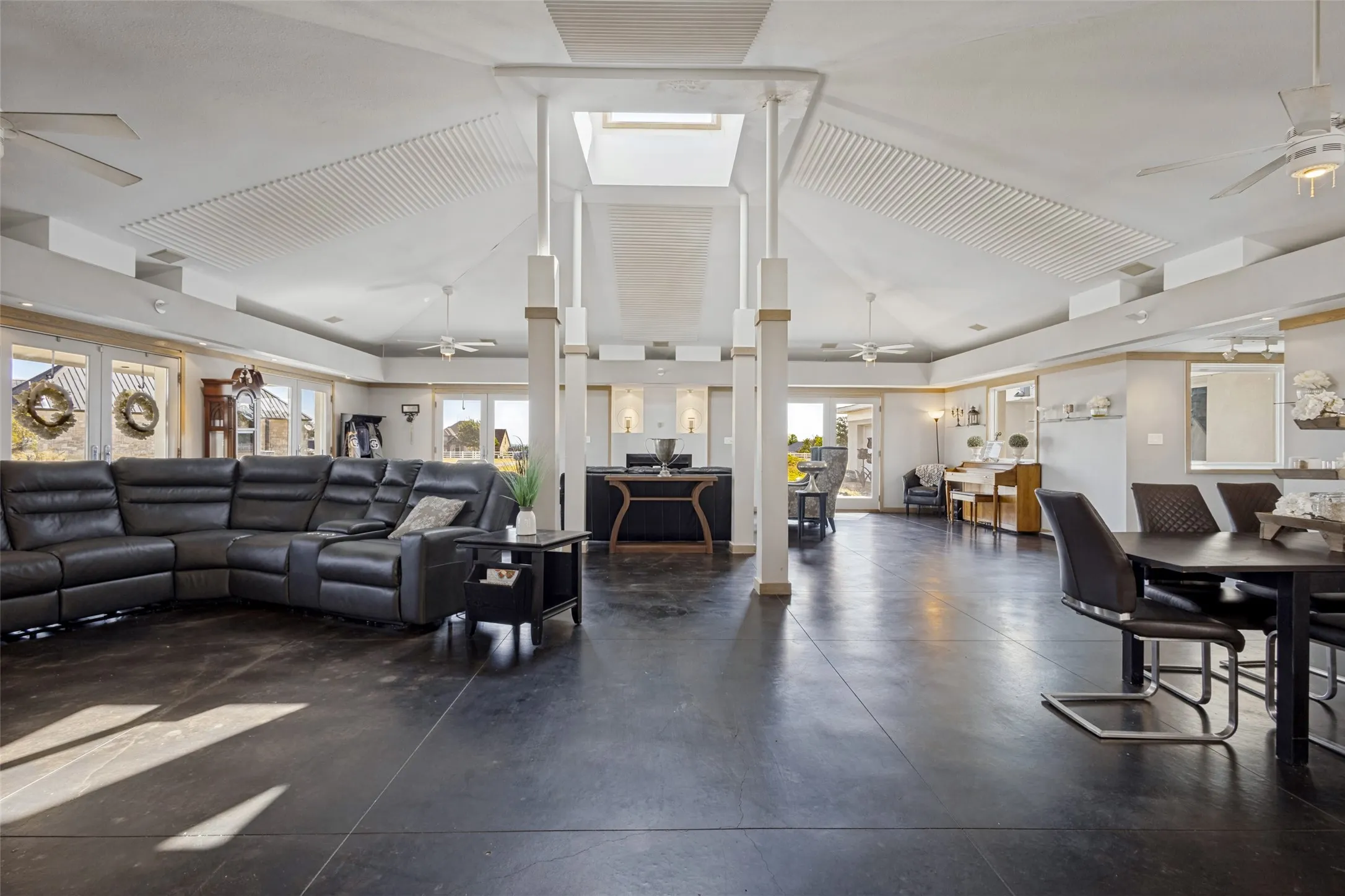 No matter what your needs, this huge room will be ideal...cozy conversation, watching the latest movie or sports event, gracious dining, a pool table awaiting a game, a grand piano or other musical equipment, a children's corner with toys and a soft rug...it has endless possibilities.