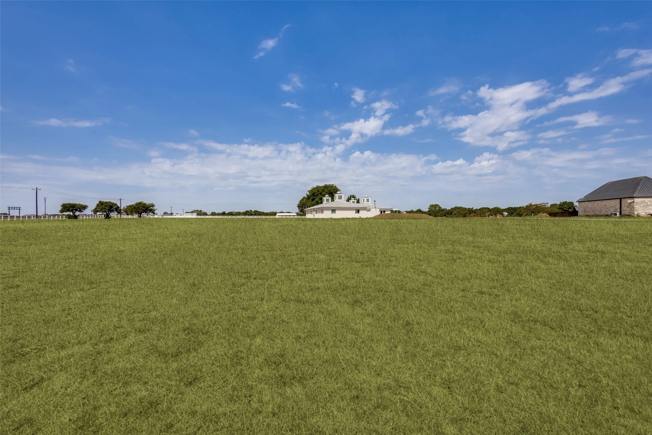 Hidden Lakes has lot sizes that range from over one acre up to approximately five acres.  With 3.01 acres, this lot, unlike the smaller ones, is allowed to have 1 large animal per acre.  They are also allowed to add two outbuildings, but additional residential buildings are not allowed.  And the outbuildings do not have to match the construction details of the residence.