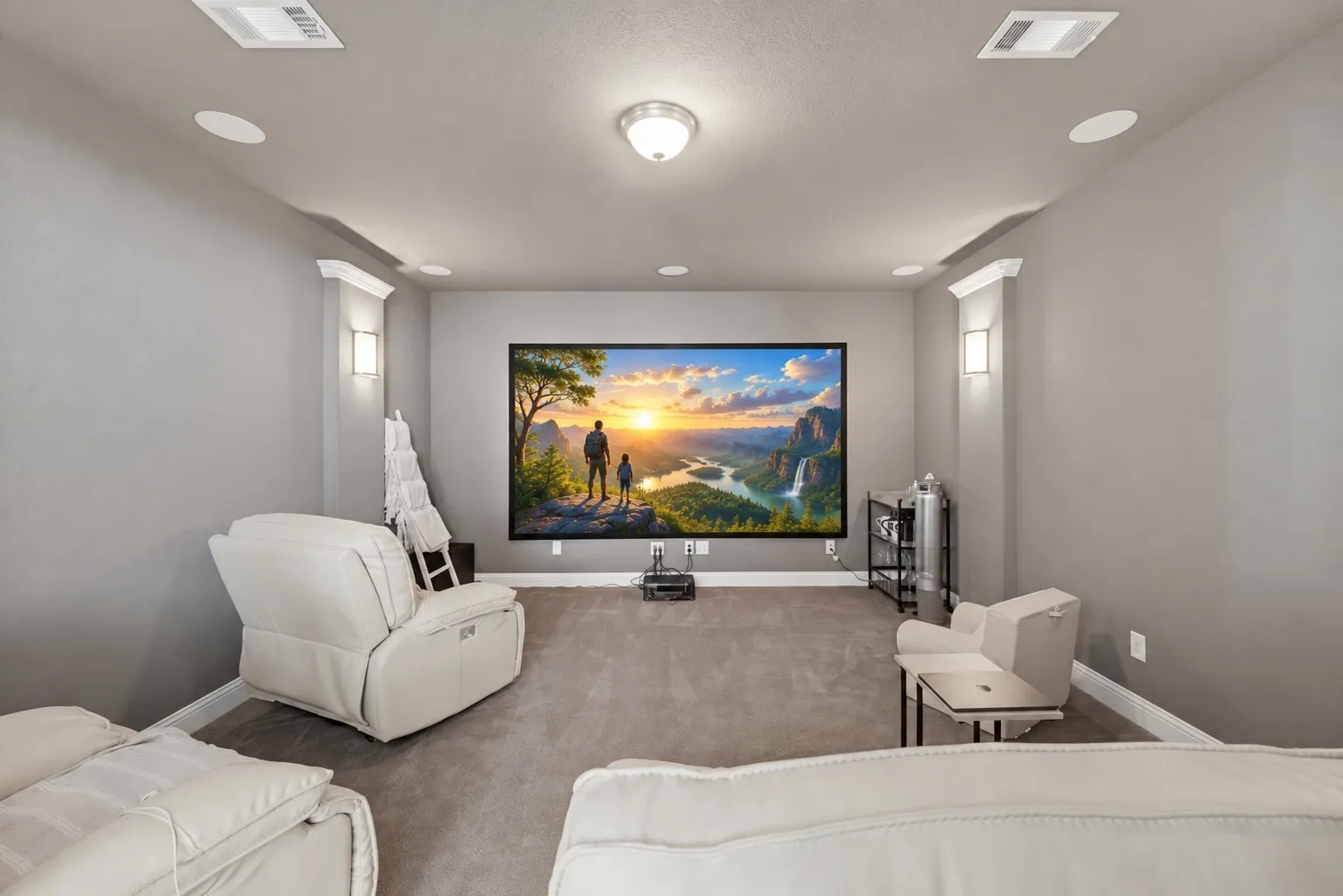Media room featuring a large projection screen, recessed lighting, and wall sconces