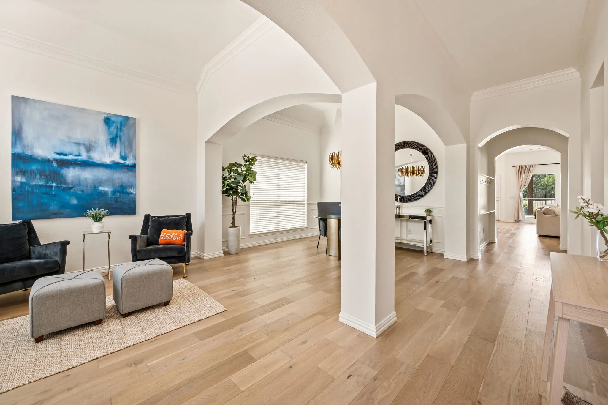 Gorgeous warm wood floors and neutral fresh paint throughout.