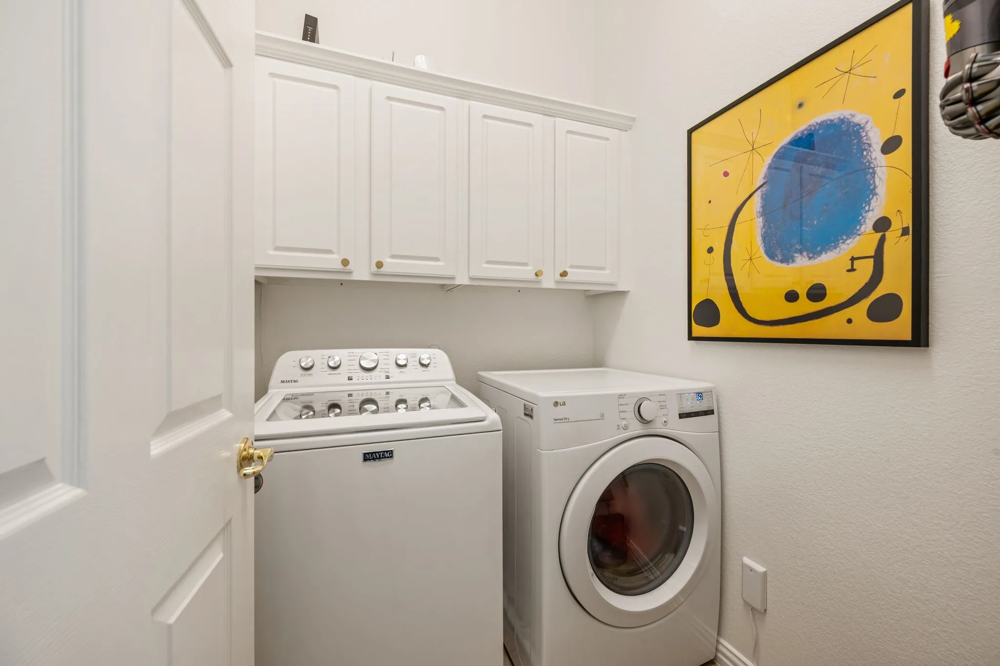 Laundry next to the kitchen.