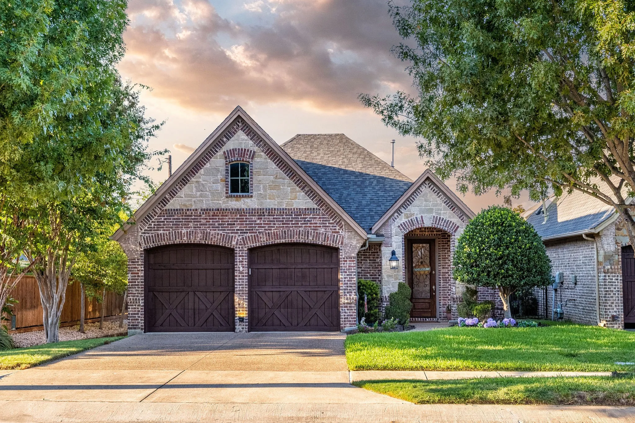 Brick and stone facade with arched entryways