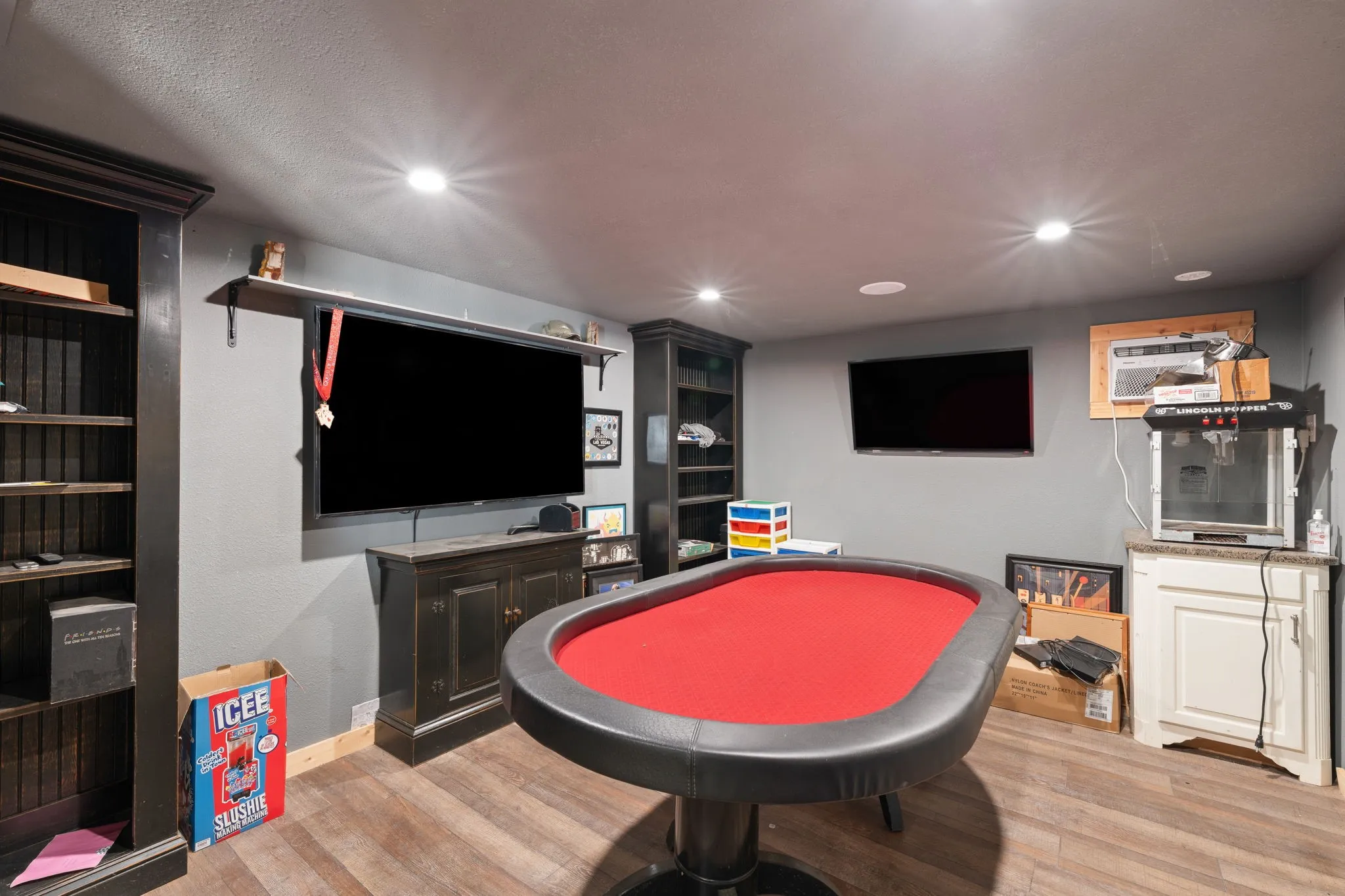 Recessed lighting, wood-finish flooring, and built-in shelving