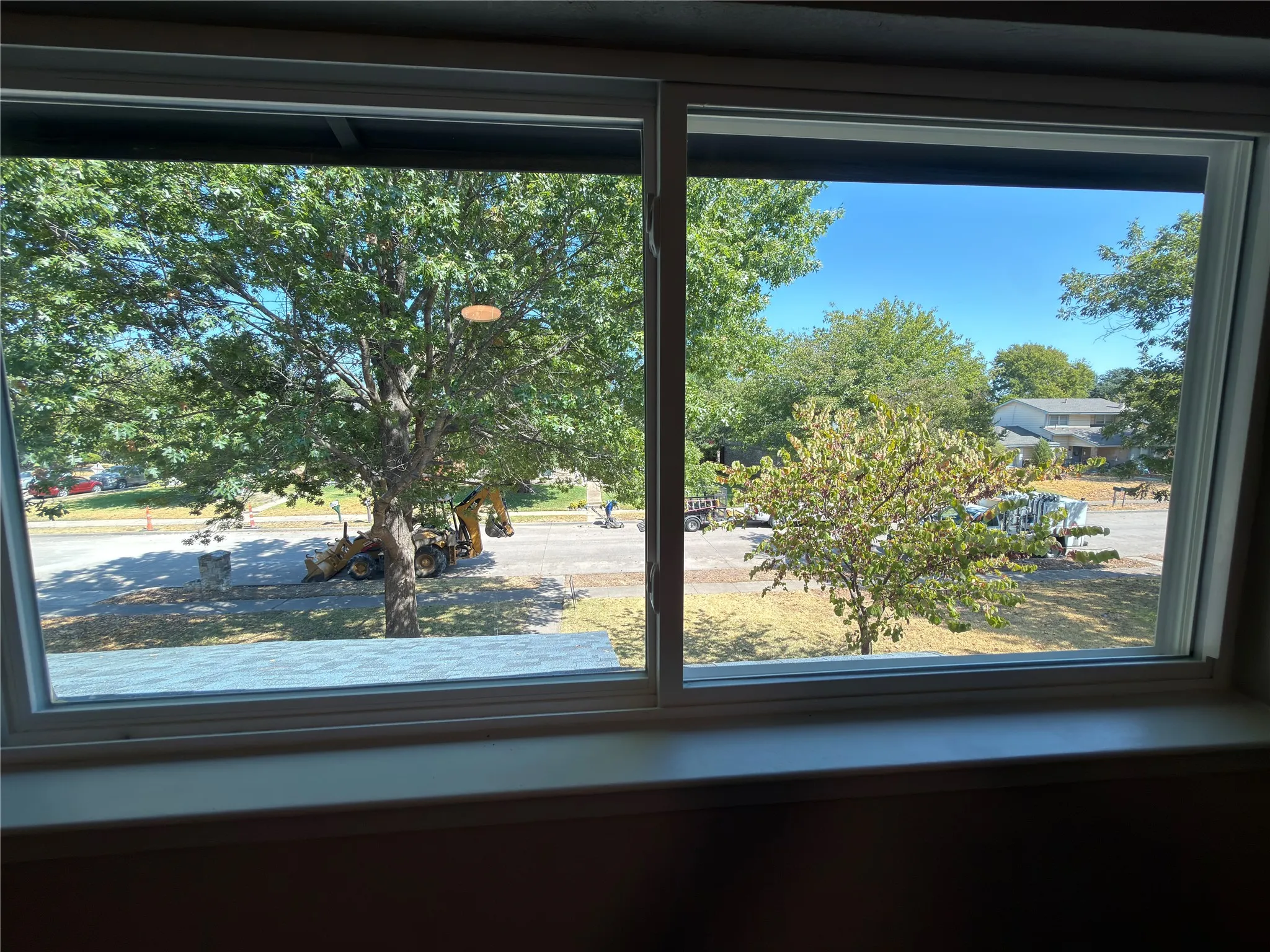 Large window with a white frame and sill