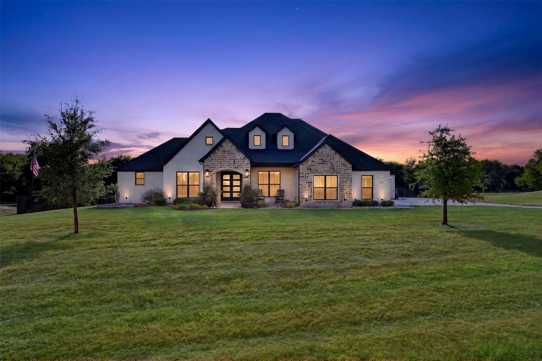 Stunning home on beautiful 1.5+ acres with trees and shop