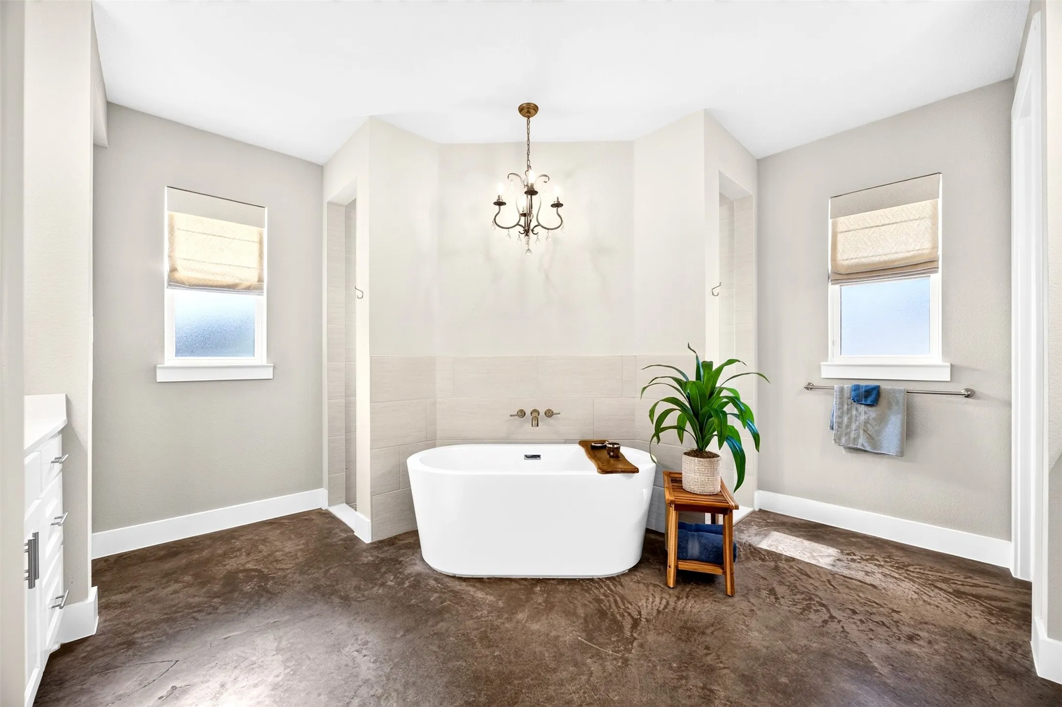 Your primary bathroom spa retreat with walk through shower, soaking tub and separate double vanities