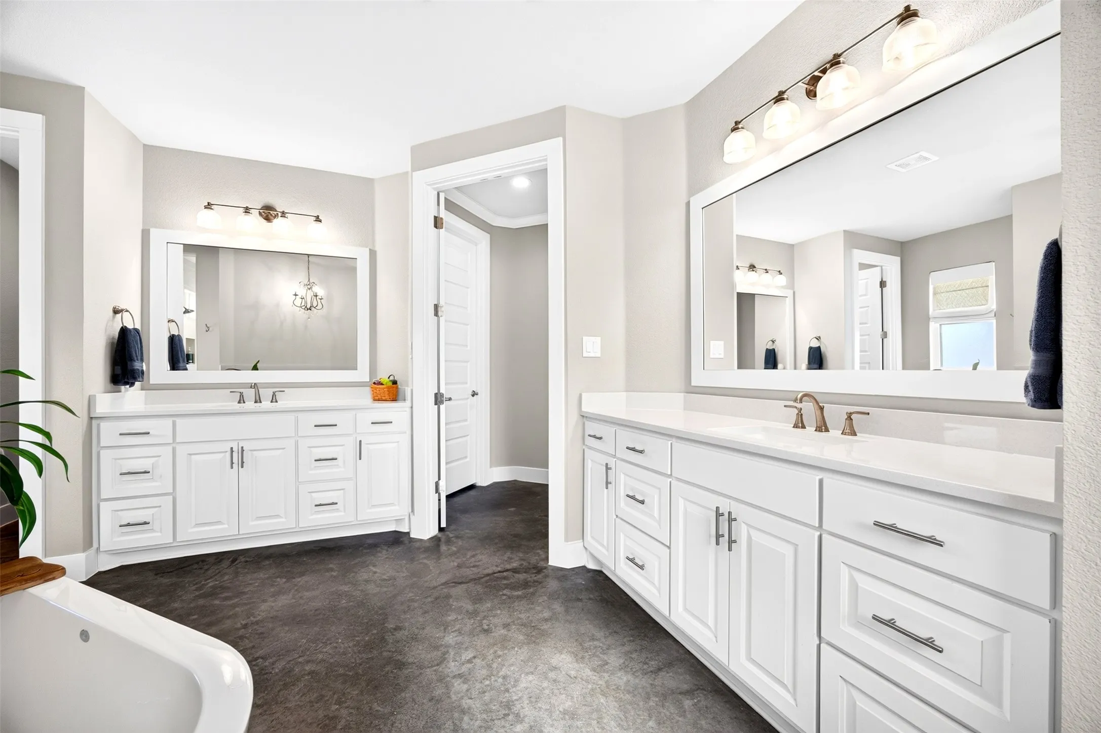 Your primary bathroom spa retreat with walk through shower, soaking tub and separate double vanities