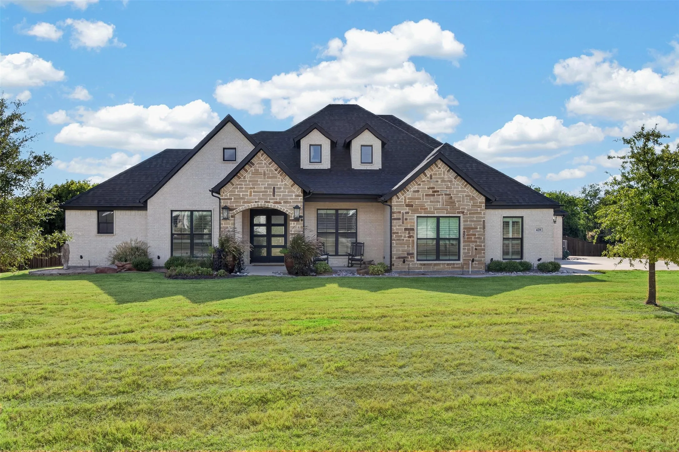Lovely home on 1.5+ acres with professional landscaping