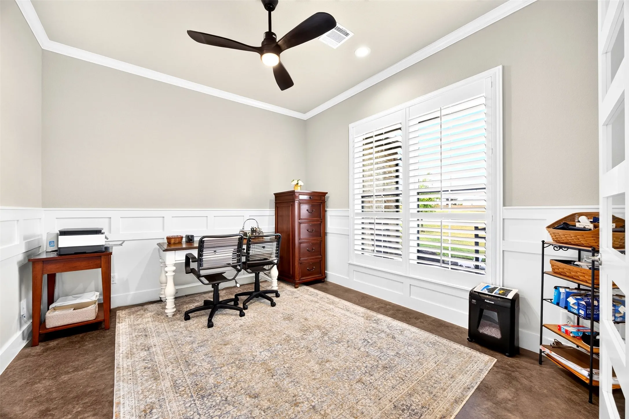 Office with beautiful board and batten walls, French doors and plantation shutters