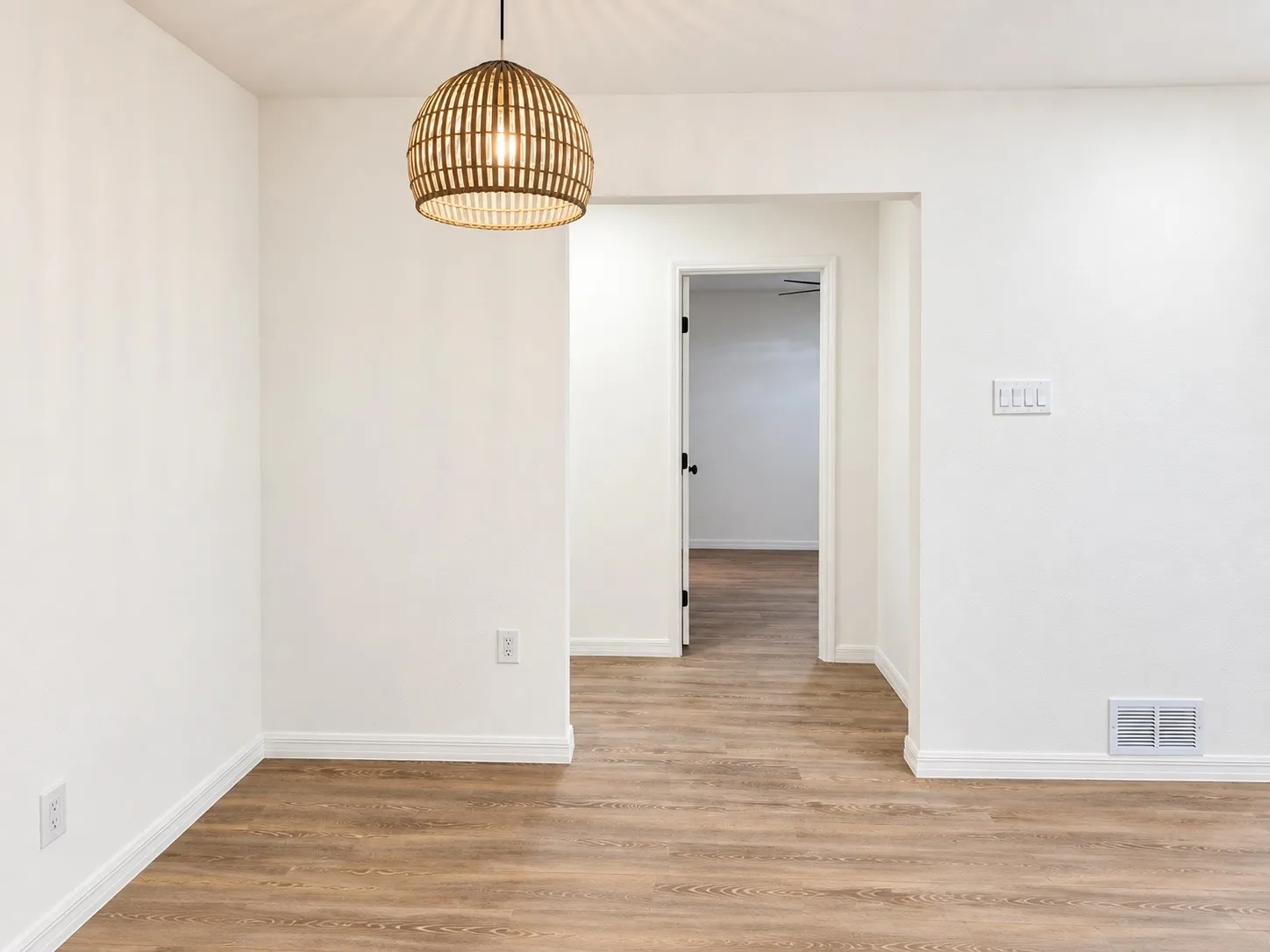 Flexible space. Could use this as a dining area or living area. Room across leads to master.