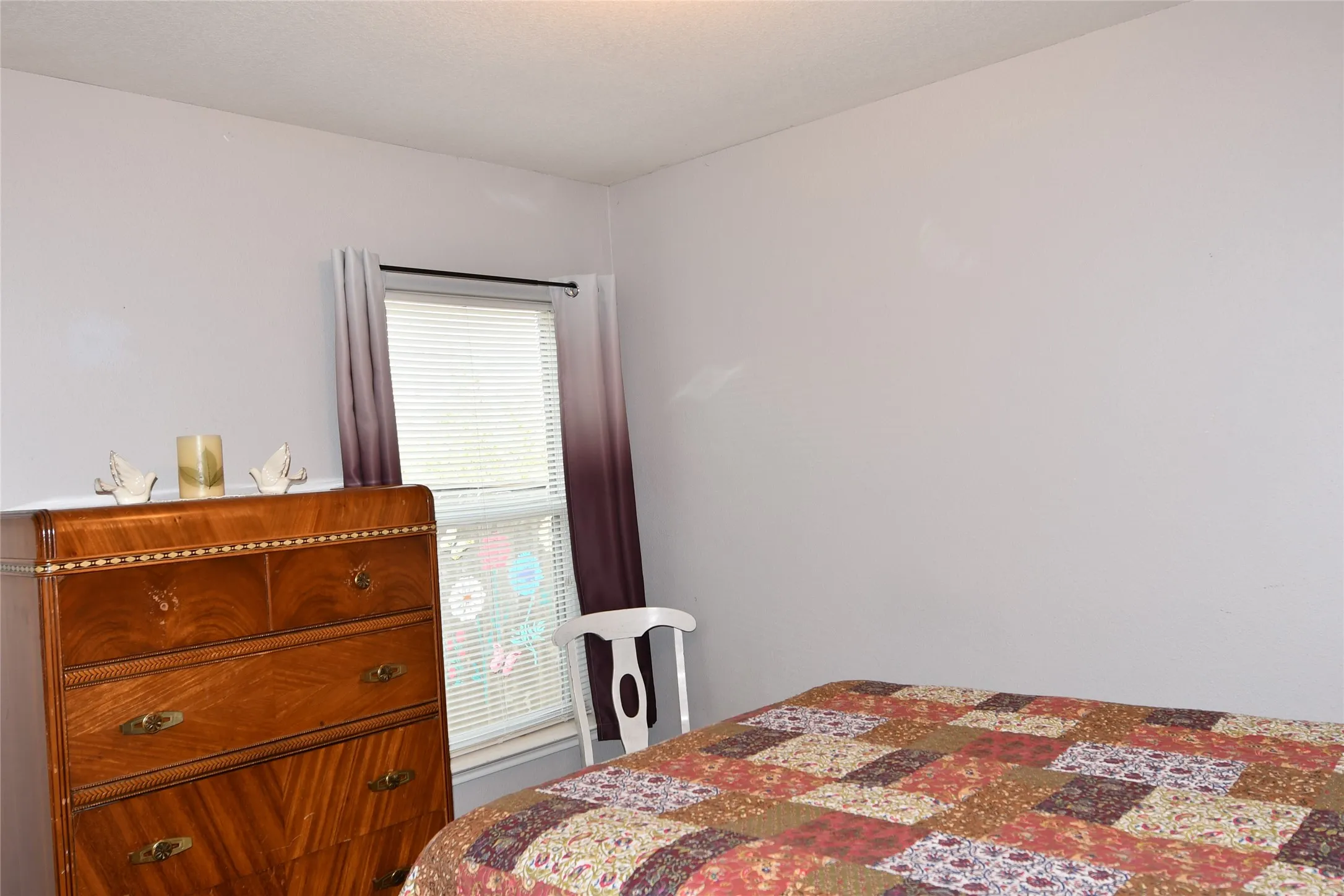 Window with blinds and curtain rod