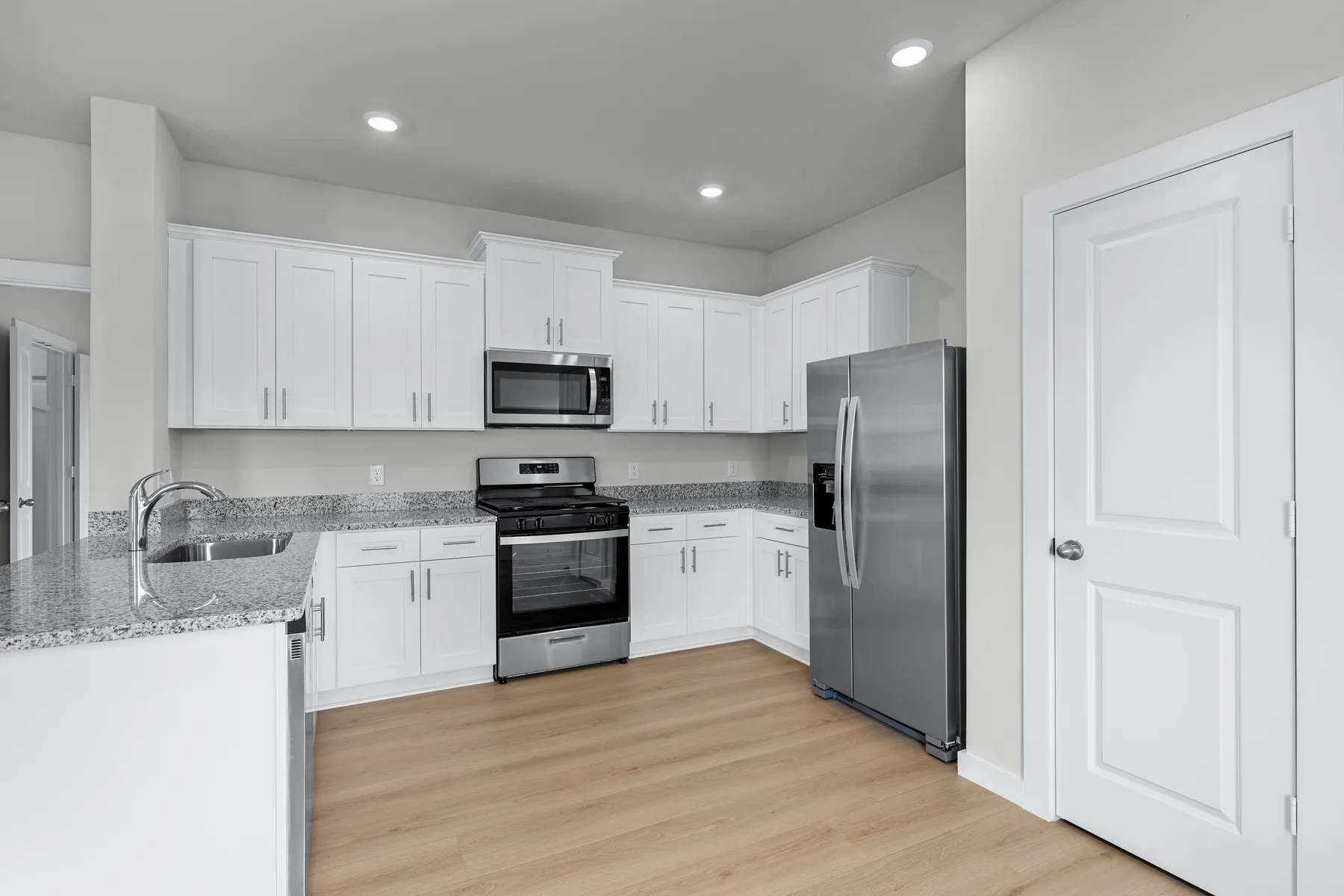 Whirlpool® kitchen appliances come standard in the home.