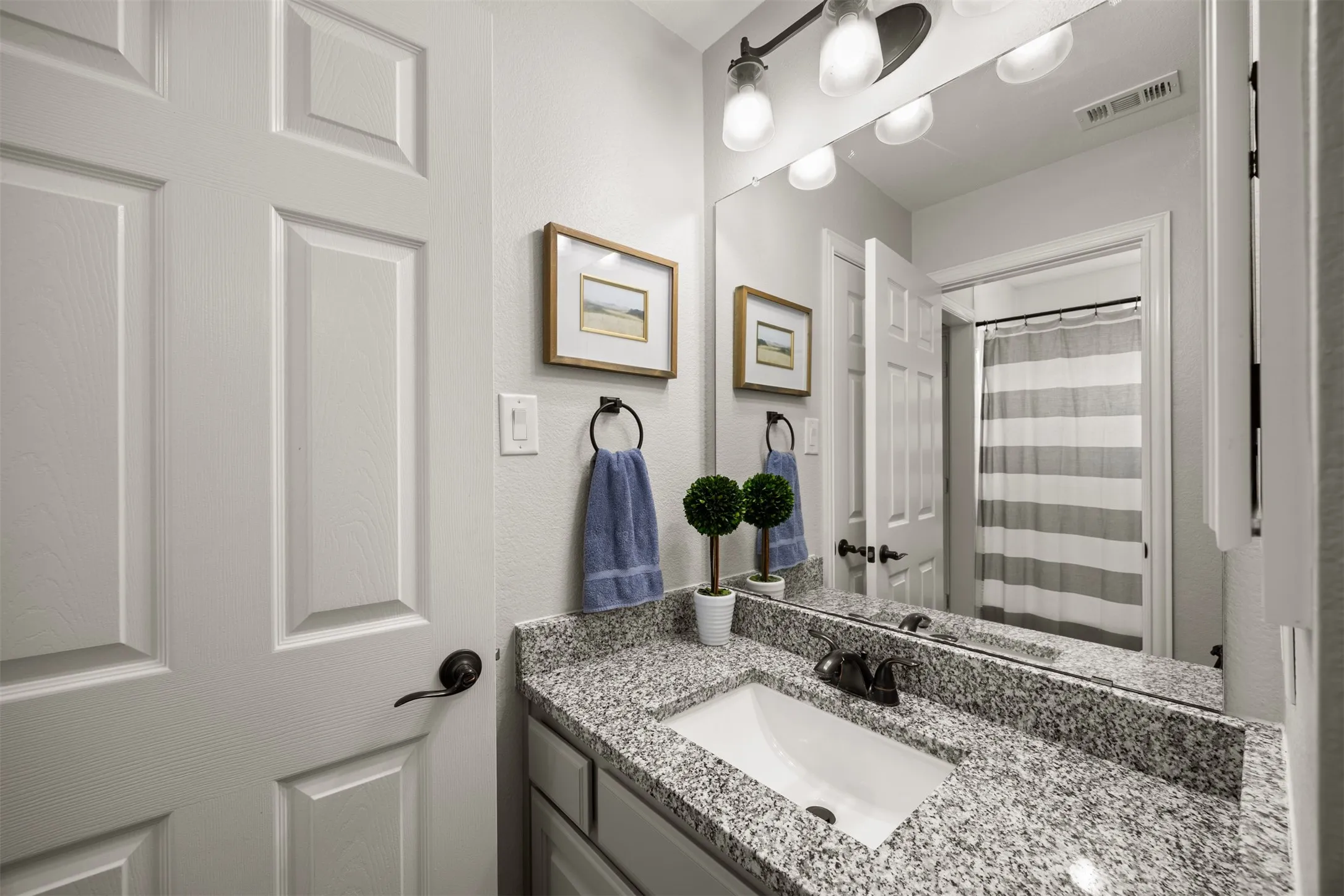 Private, remodeled upstairs bath next to a bedroom & the game room