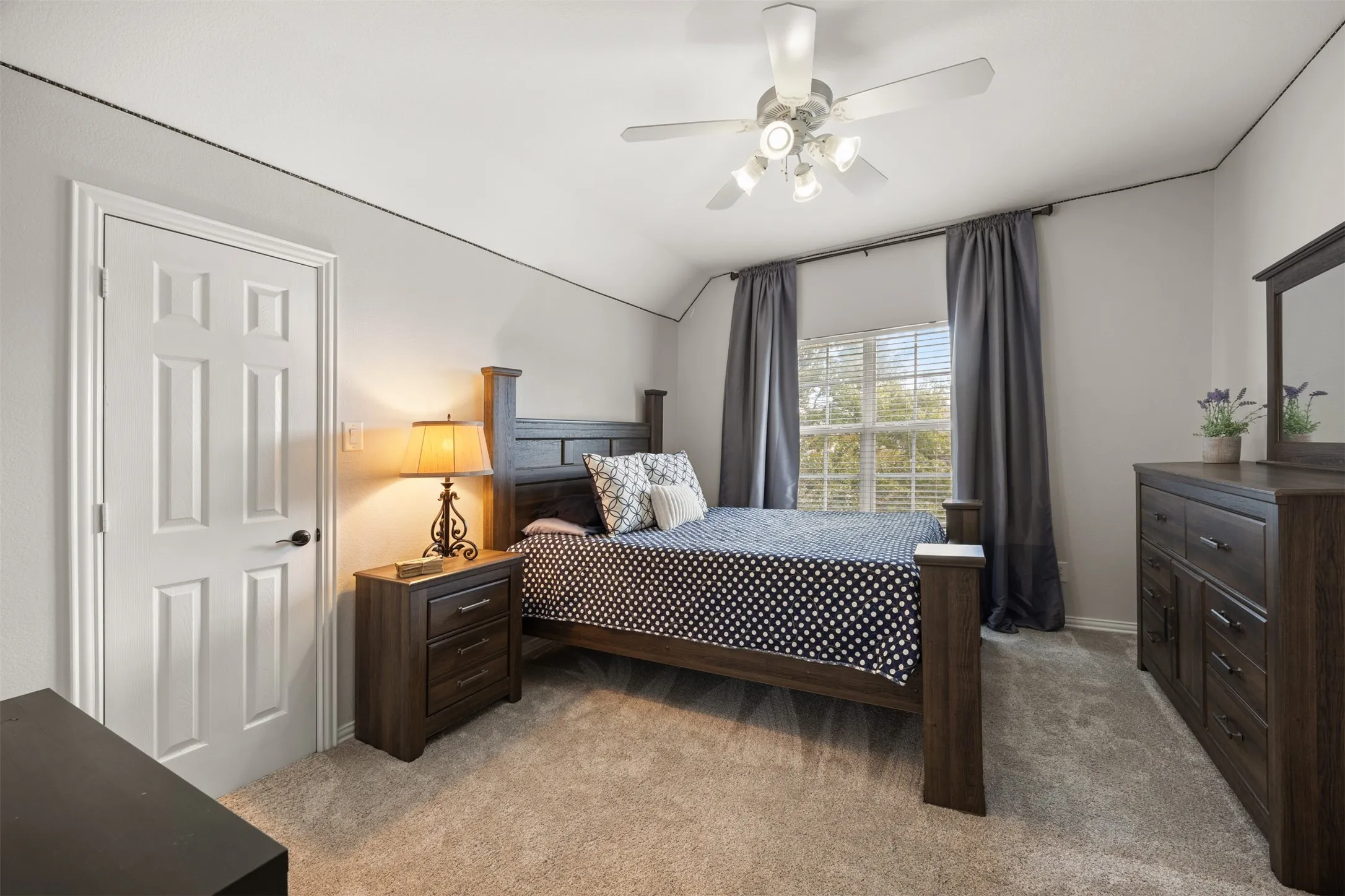 Separate upstairs bedroom with a large closet leading to attic access