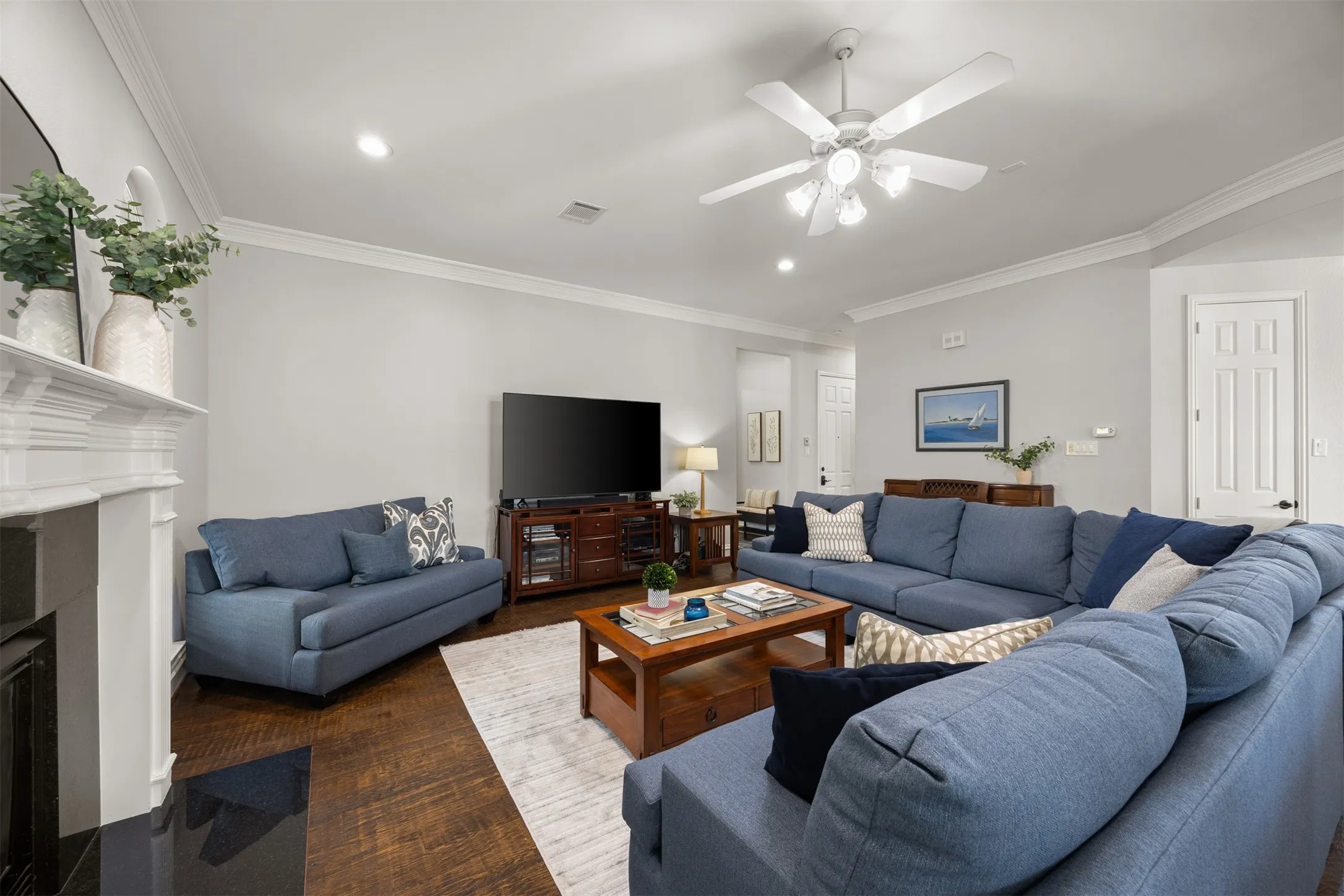 Cozy fireplace is a focal point in this lovely living room!