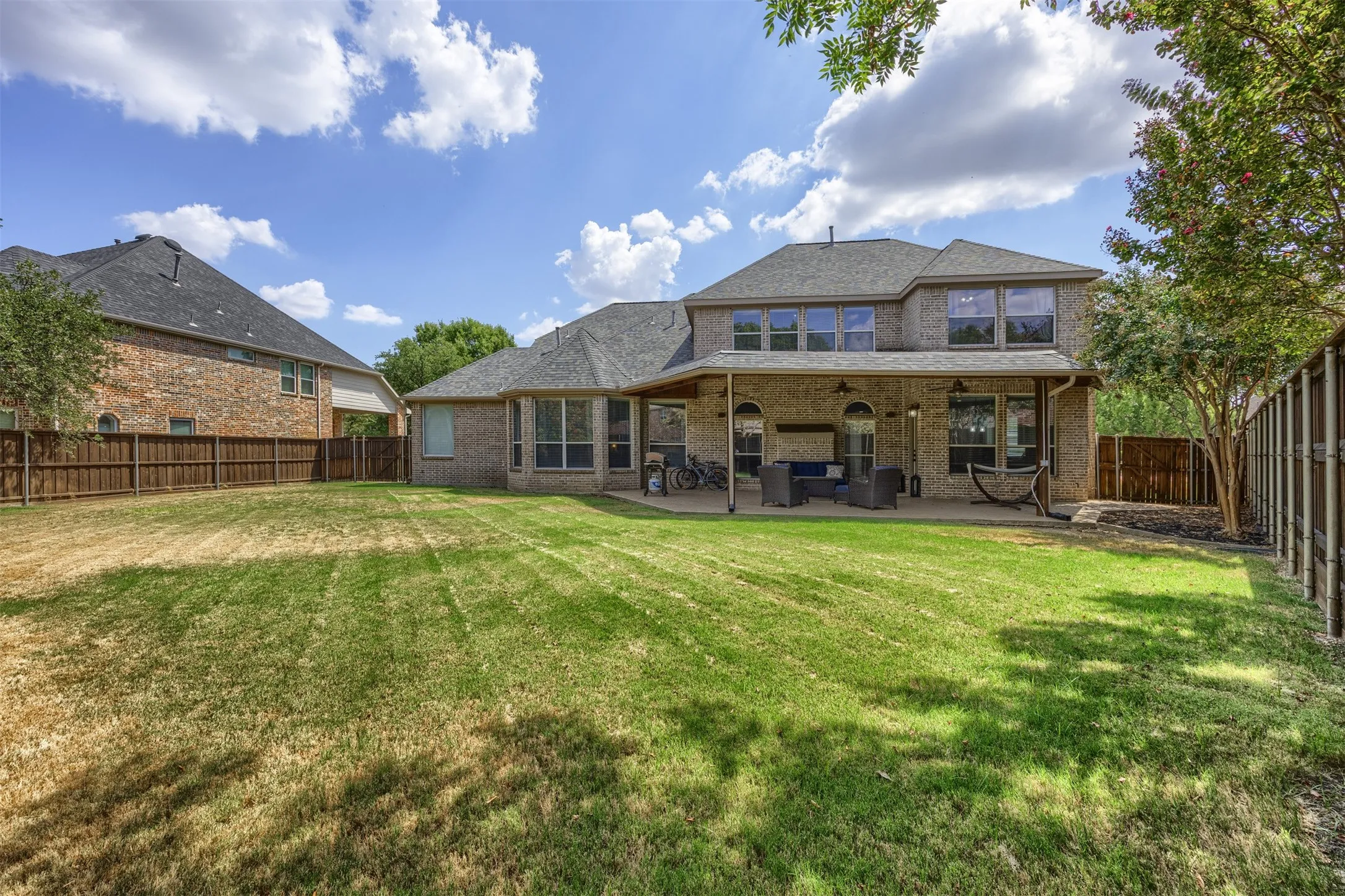 Step outside to a backyard with lots of room to run, play & plenty of room to create your dream pool paradise.