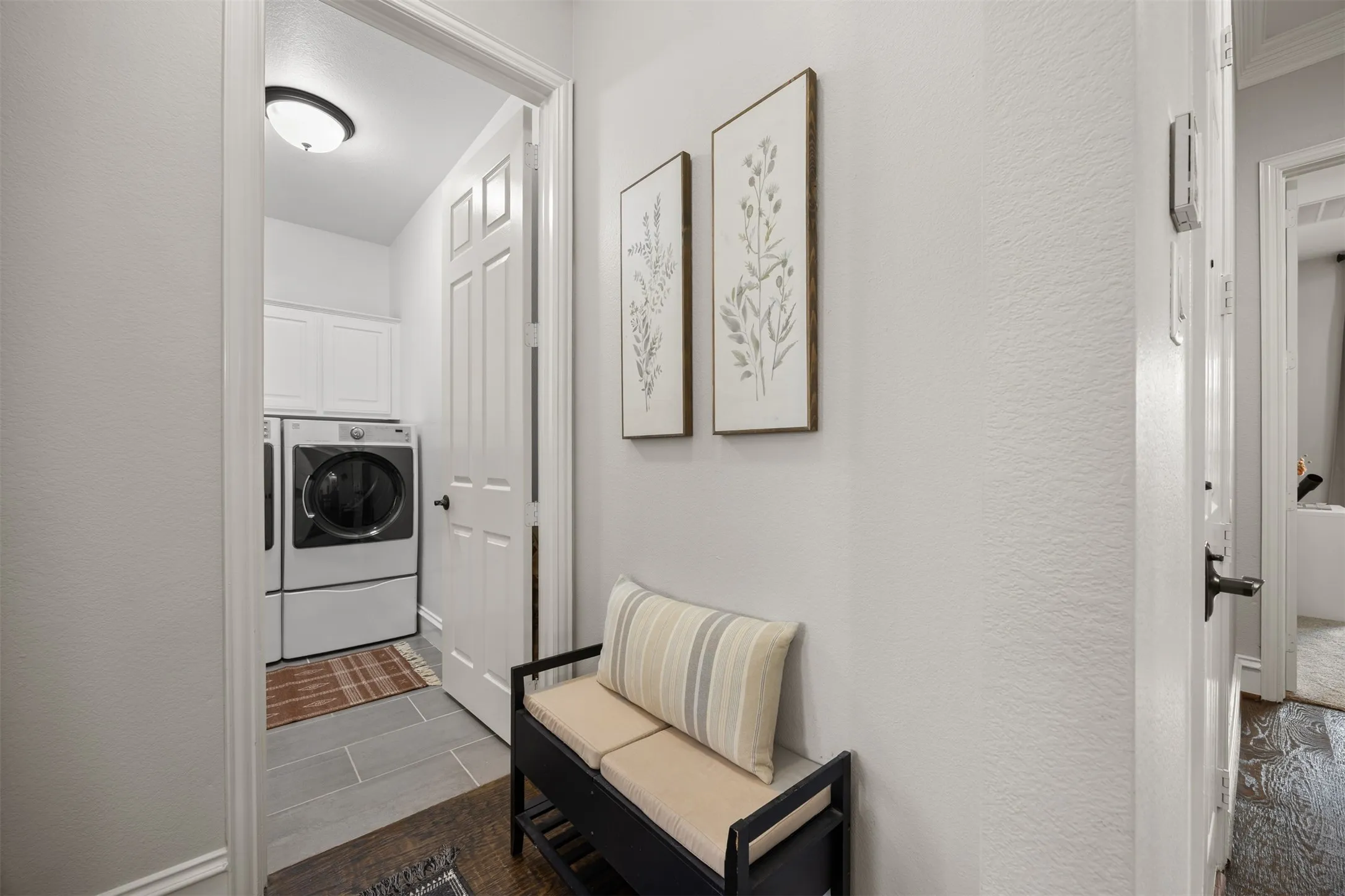 This convenient area has room for a bench or mud space!