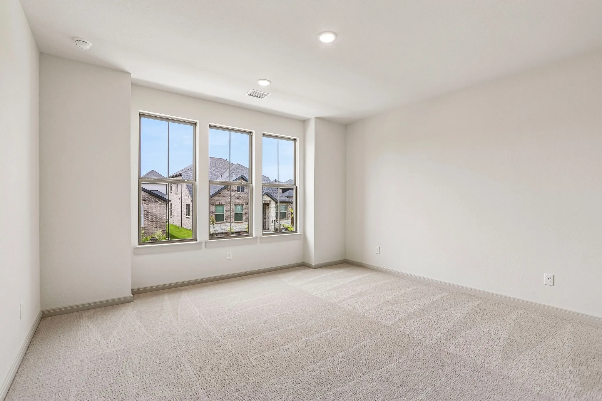 You'll find nicely sized secondary bedrooms in our Gaston plan.