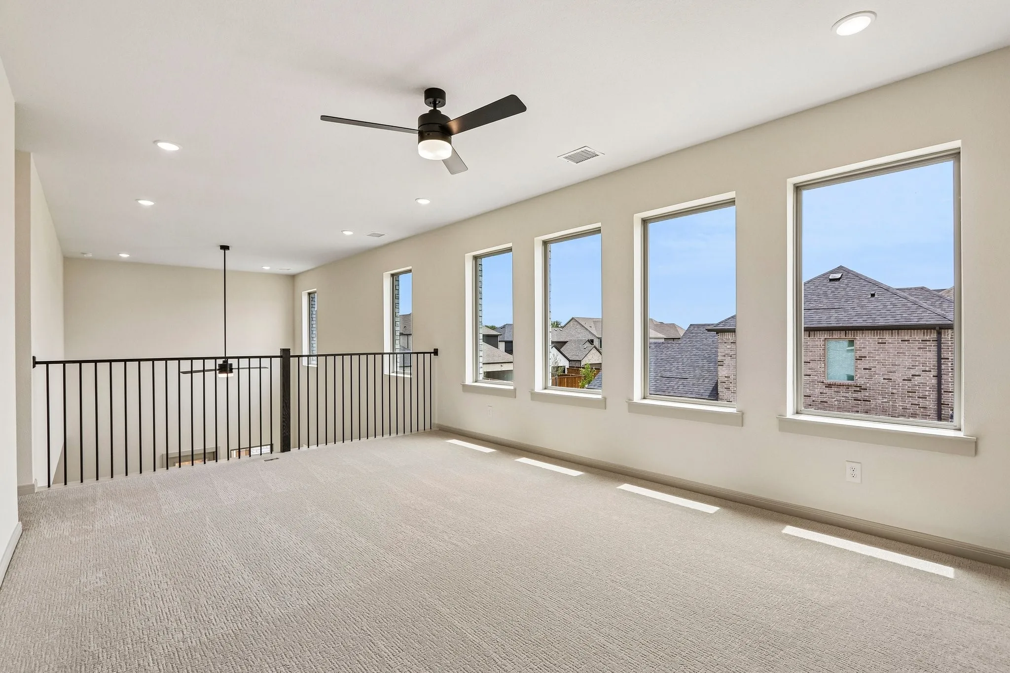 The entire family will love entertaining in this light bright and spacious game room.