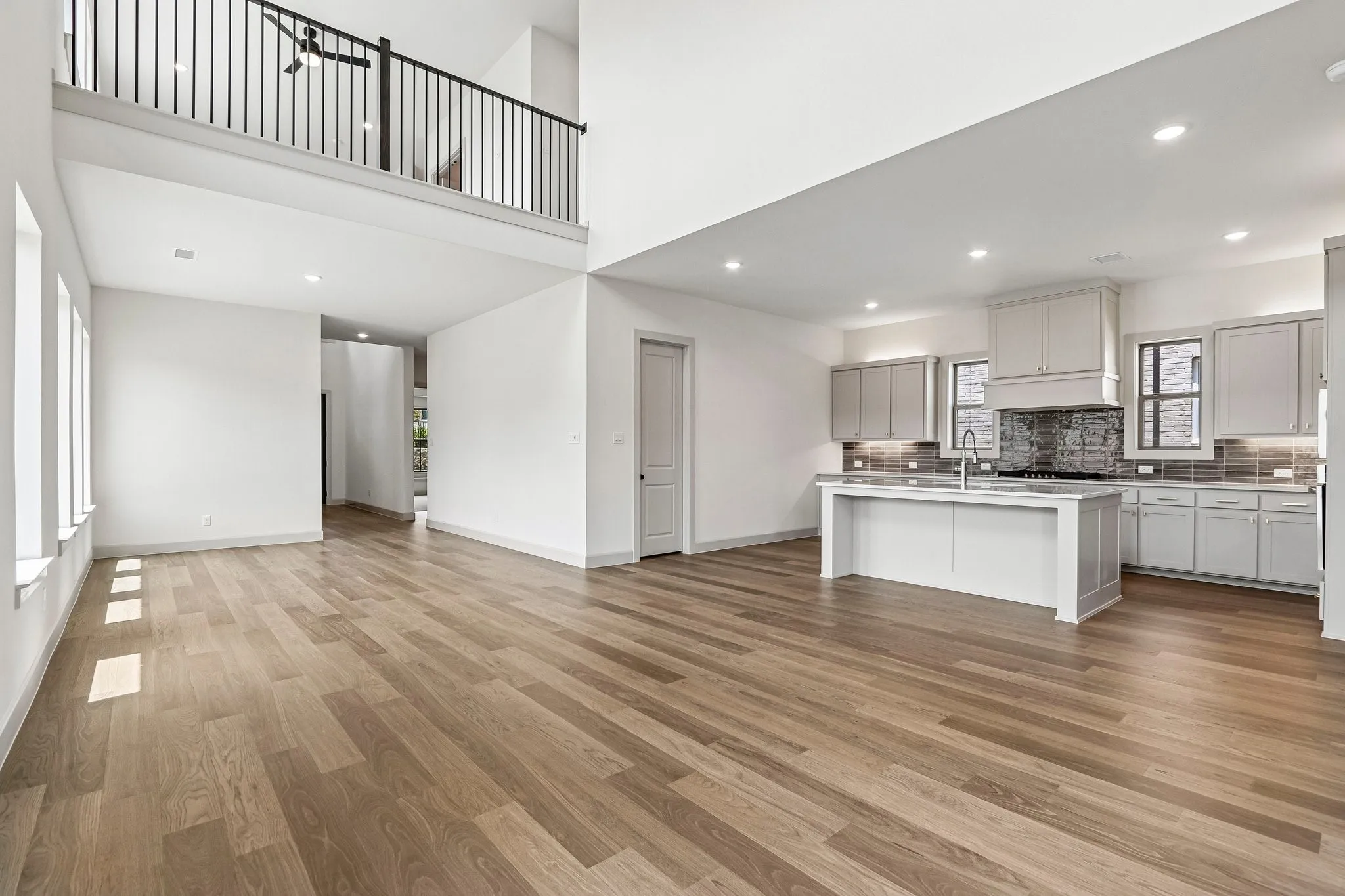 Offering a game room open to the family room below, you'll enjoy a dual level entertainment zone in this dream home.