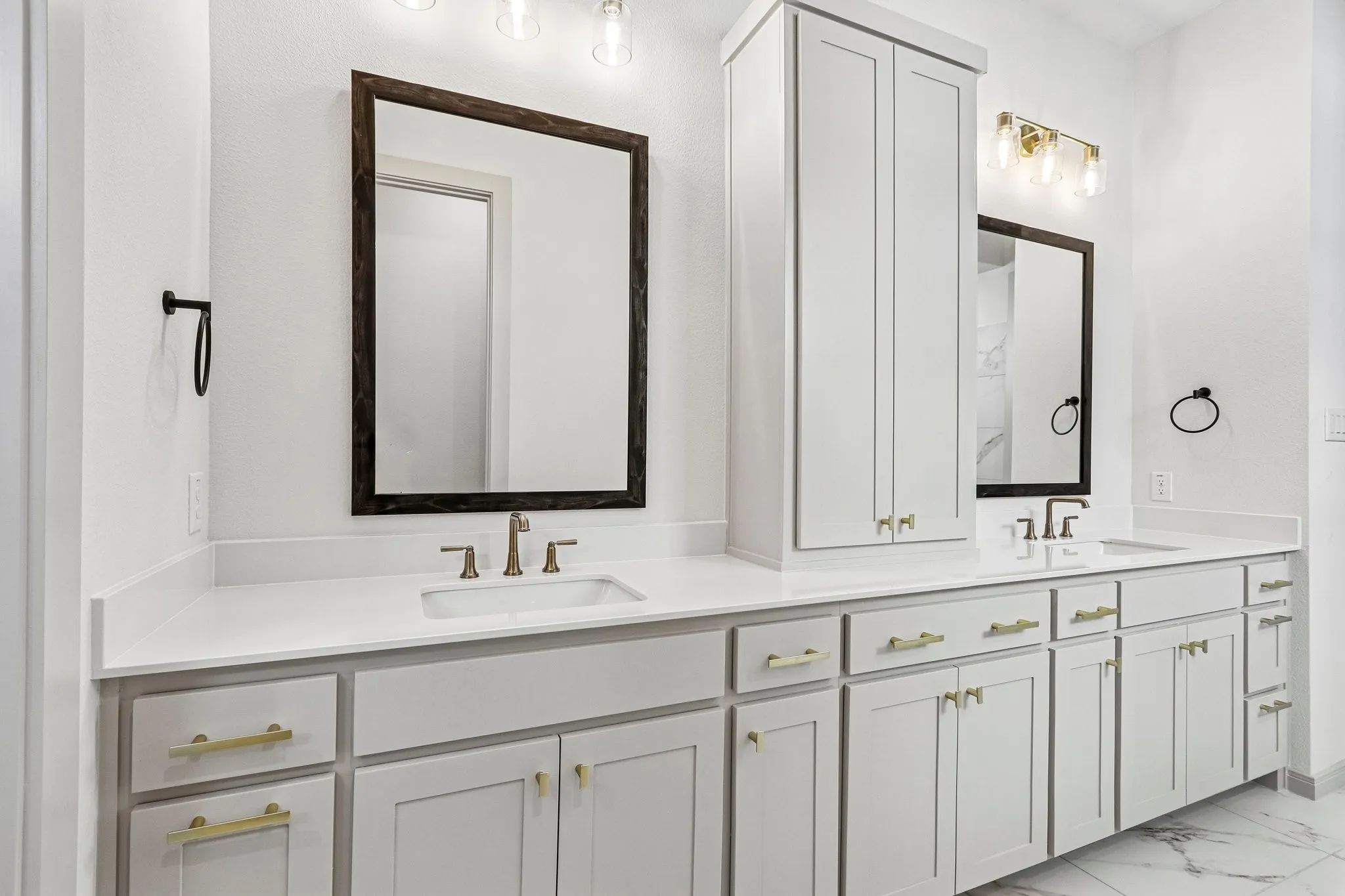 Your thoughtfully designed owner's bath offers ample room for two!