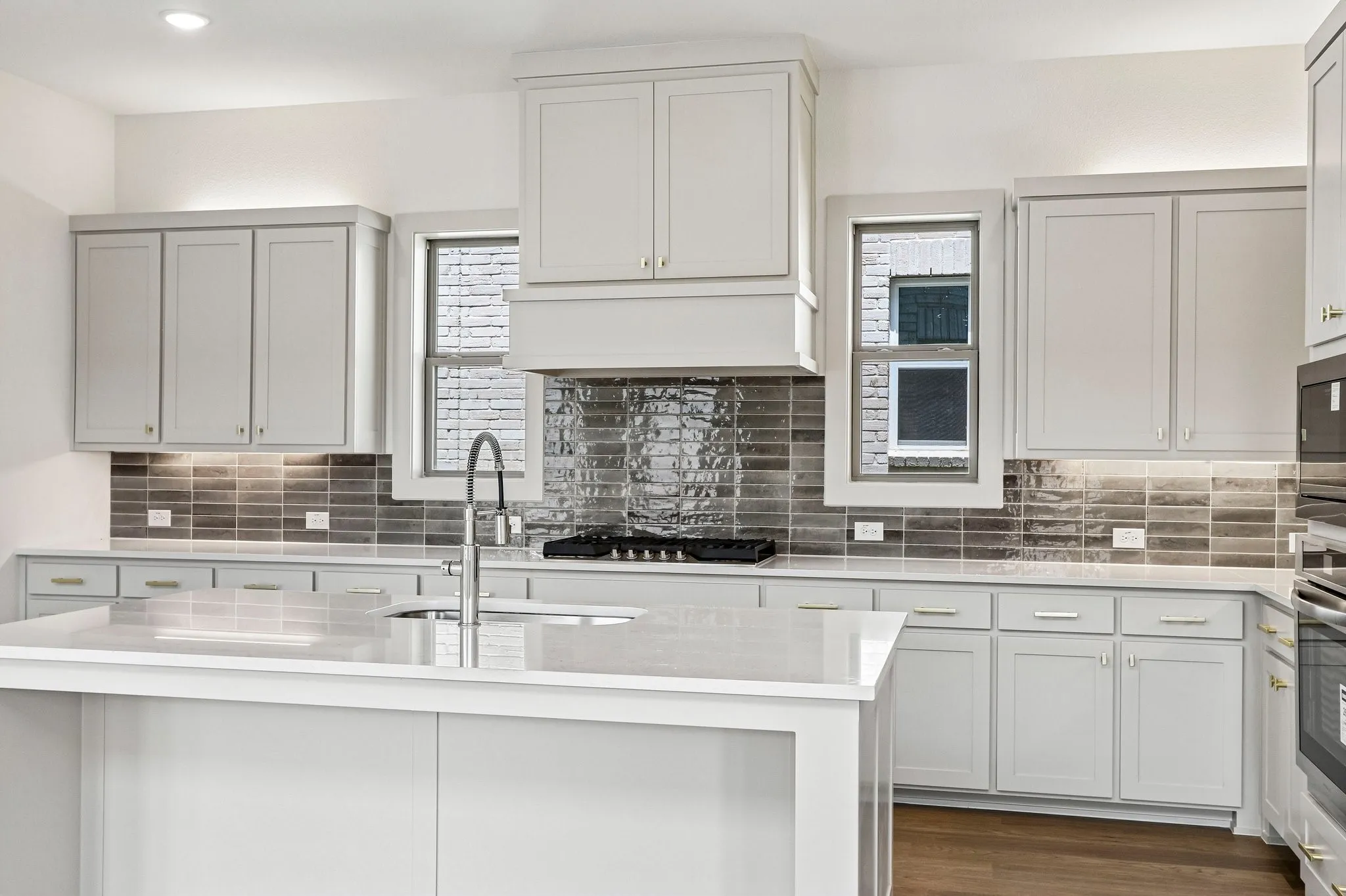 Beautiful cabinetry and gorgeous countertops paired with contemporary stainless steel create the kitchen of your dreams!