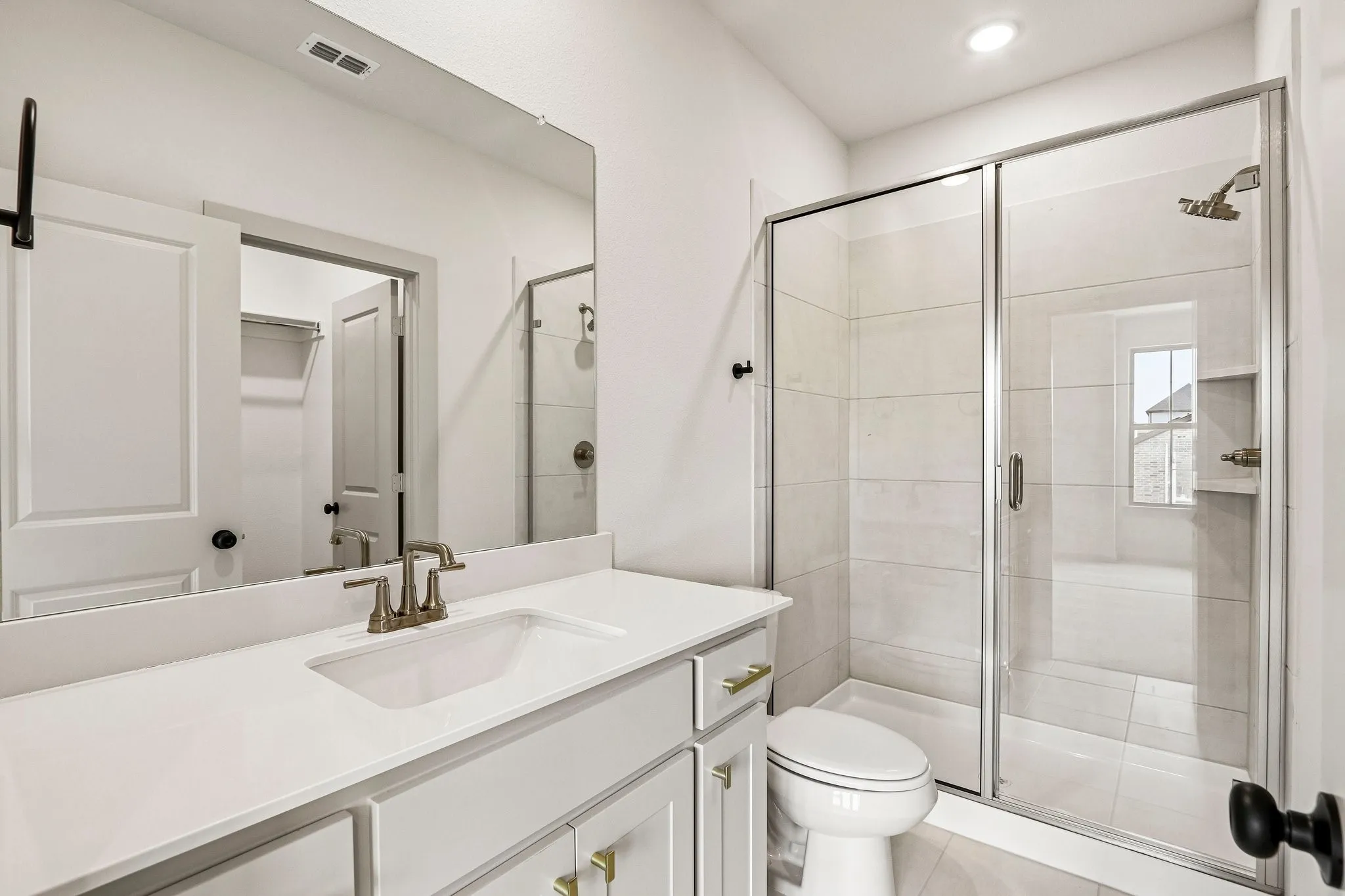 Friends and family will feel right at home in any of the beautifully finished guest baths.