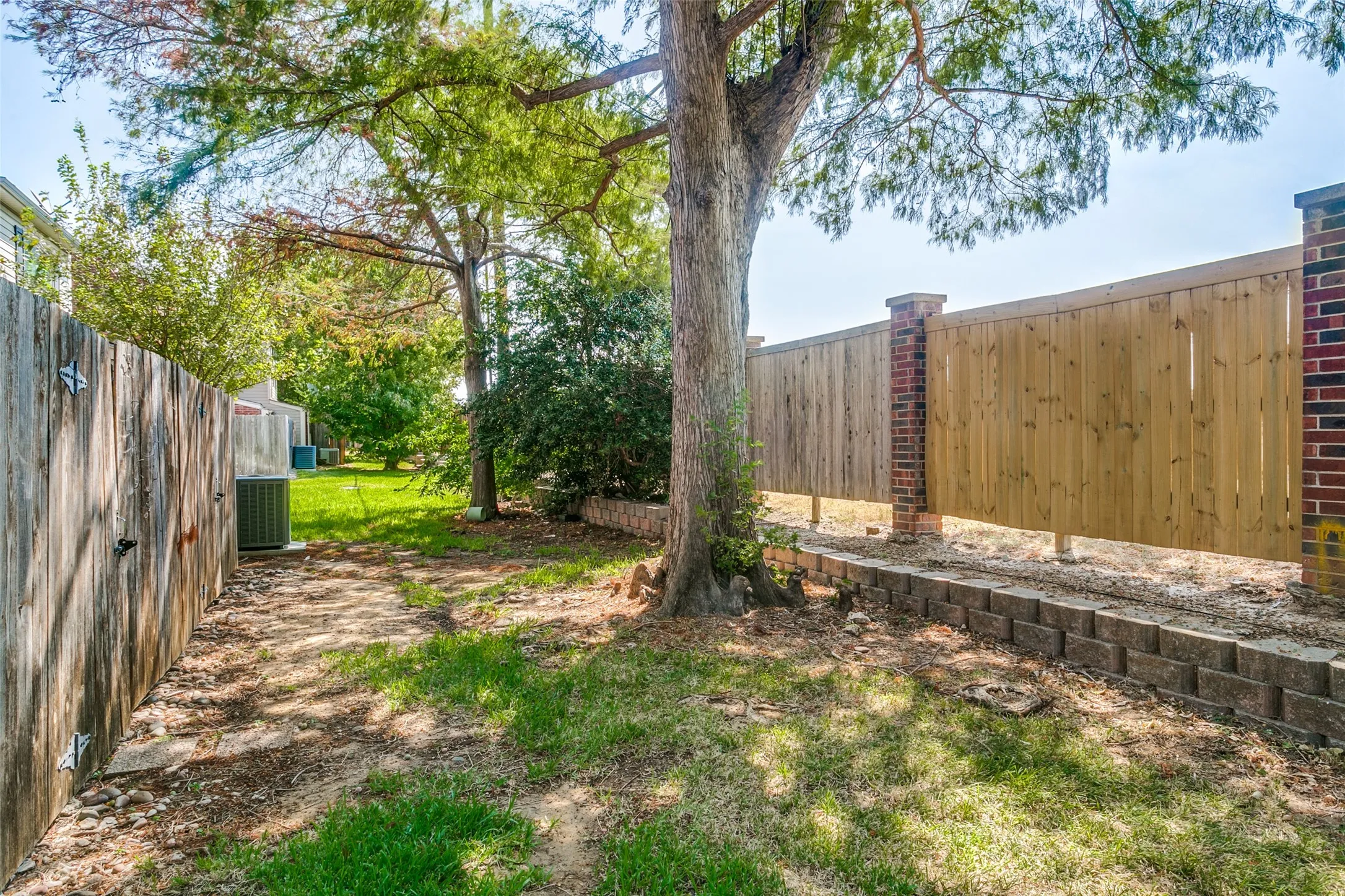 Green space directly behind unit