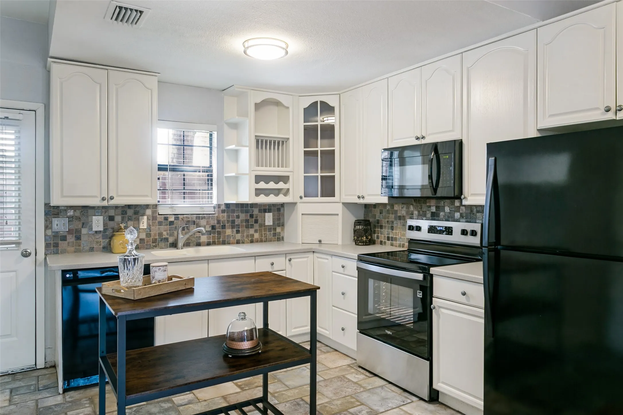 spacious kitchen open to dining