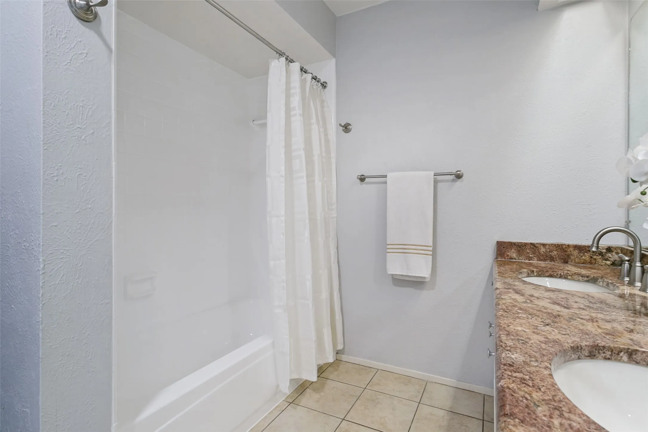 Dual sinks, large tub/shower and plenty of storage